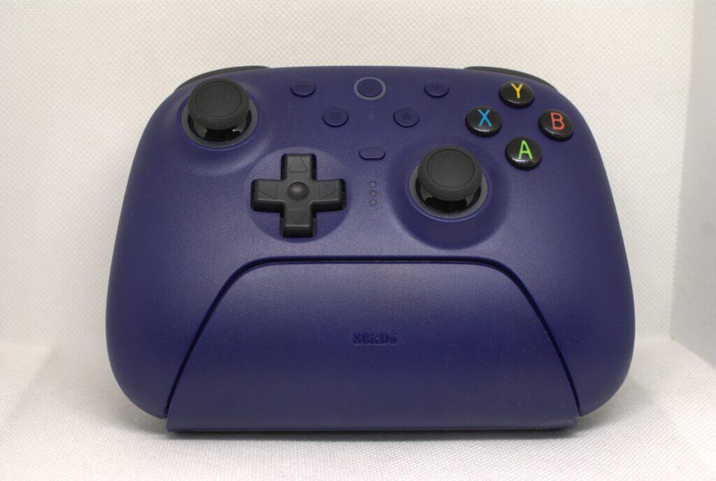 8BitDo Ultimate 2 - on dock, front