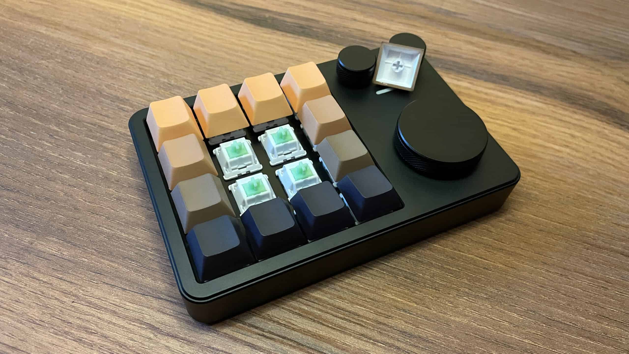 KiiBOOM Cybrix 16 macropad with keycaps removed, showing the mechanical switches underneath.