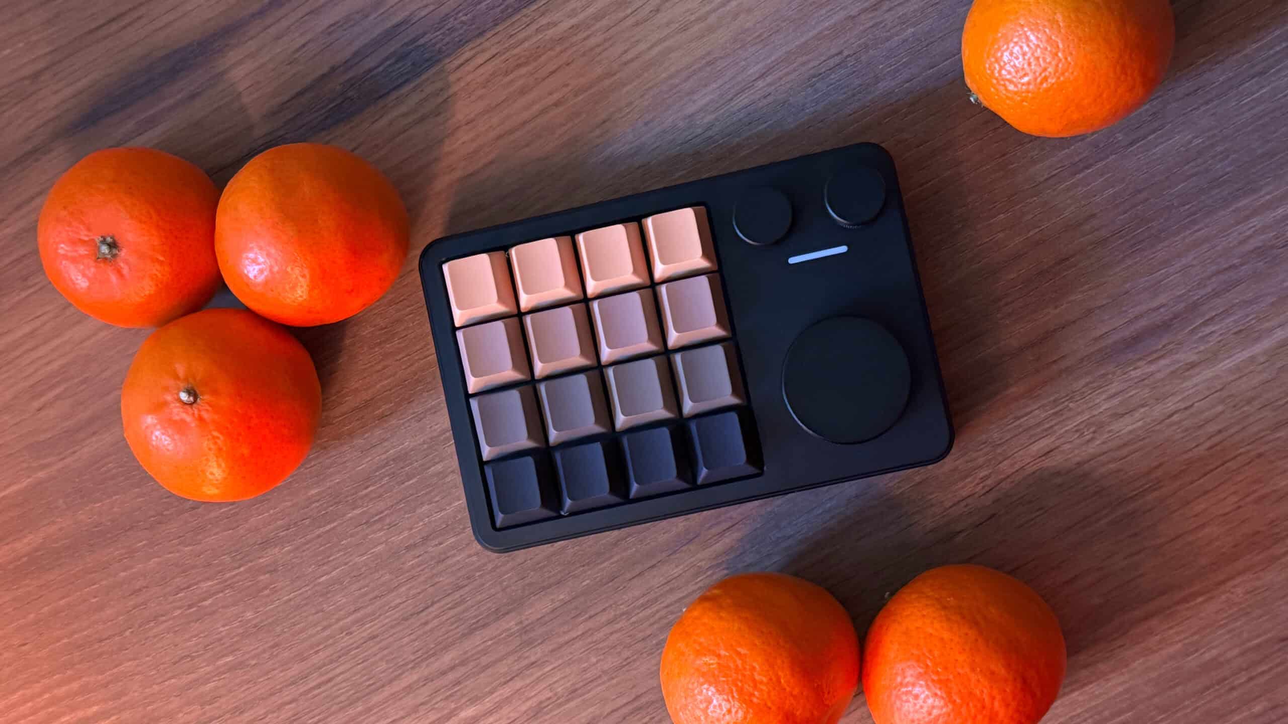 KiiBOOM Cybrix 16 macropad photographed on a desk in a clean, aesthetic setup.