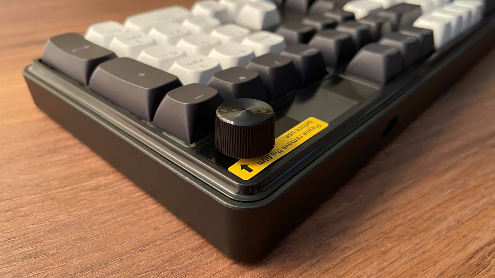 Close-up of the knob on the Redragon Wyvern K761 Pro mechanical keyboard showing its texture and design details.