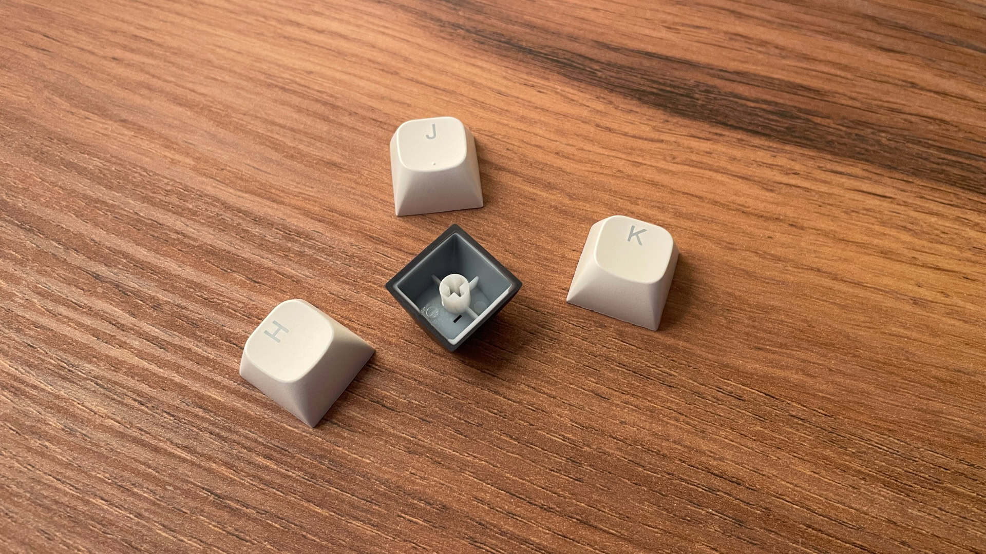 Close-up view of the keycaps on the Redragon Wyvern K761 Pro mechanical keyboard showing texture and legends.