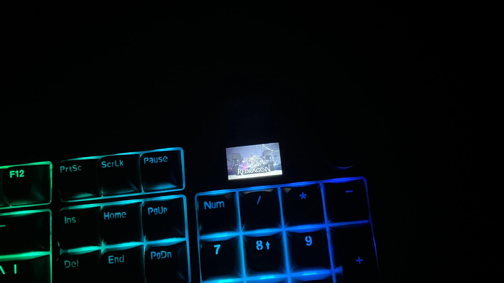 Default GIF animation displayed on the built-in screen of the Redragon Wyvern K761 Pro keyboard.