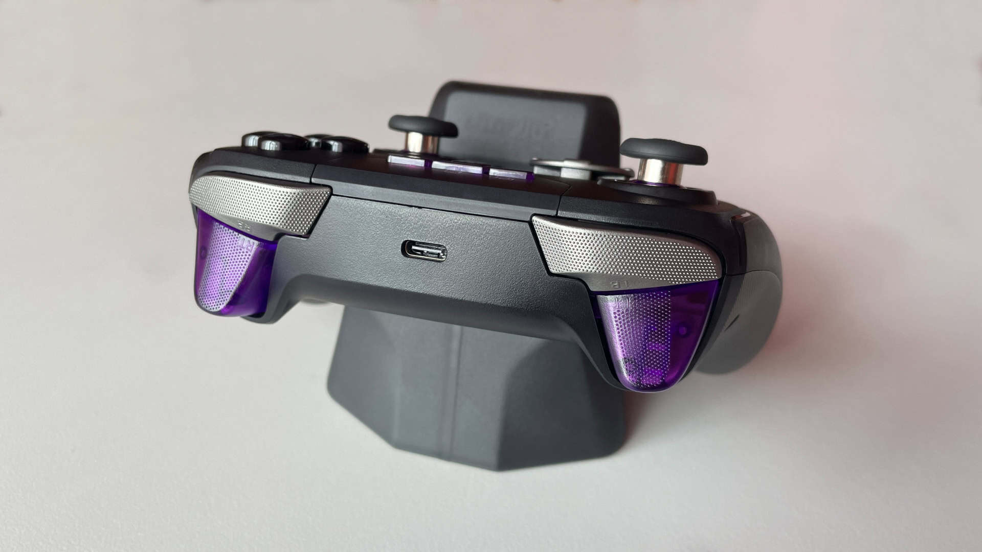 Close-up view of the top section of the Leadjoy Xeno Plus controller showing the triggers and bumpers.