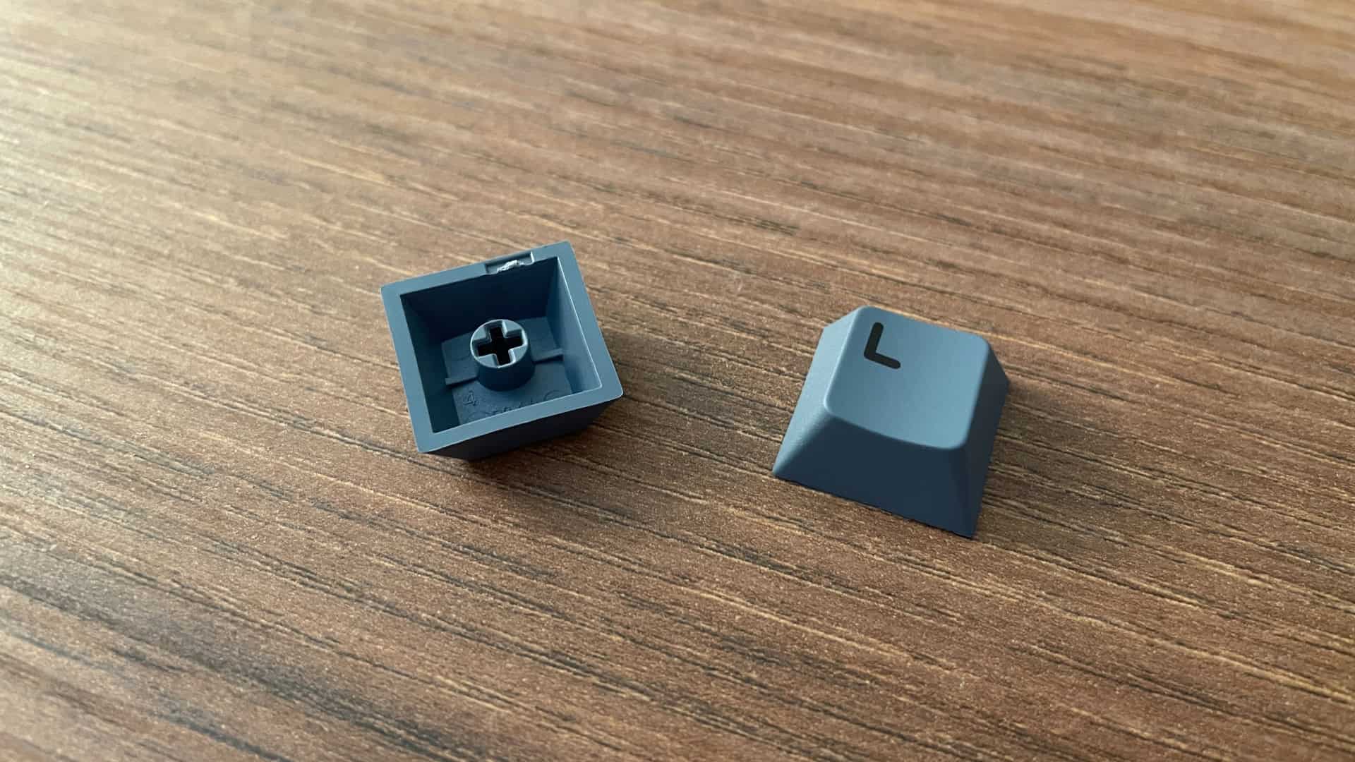 Close-up view of the Epomaker Split65 keycaps showing their surface texture and legends.