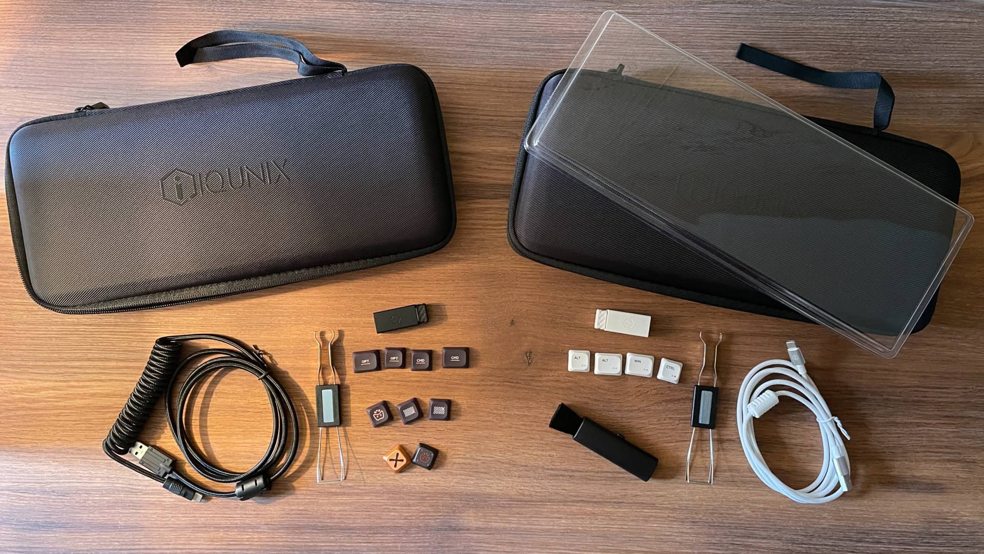 Side-by-side comparison of the included accessories and package contents for the IQUNIX Magi75 mechanical keyboard on the left and the IQUNIX MQ80 mechanical keyboard on the right.