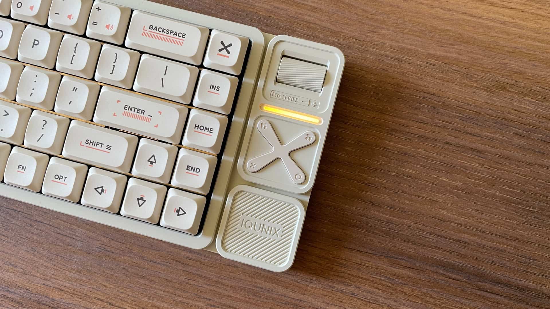 Close-up of the multimedia module on the IQUNIX Magi65 Pro mechanical keyboard.