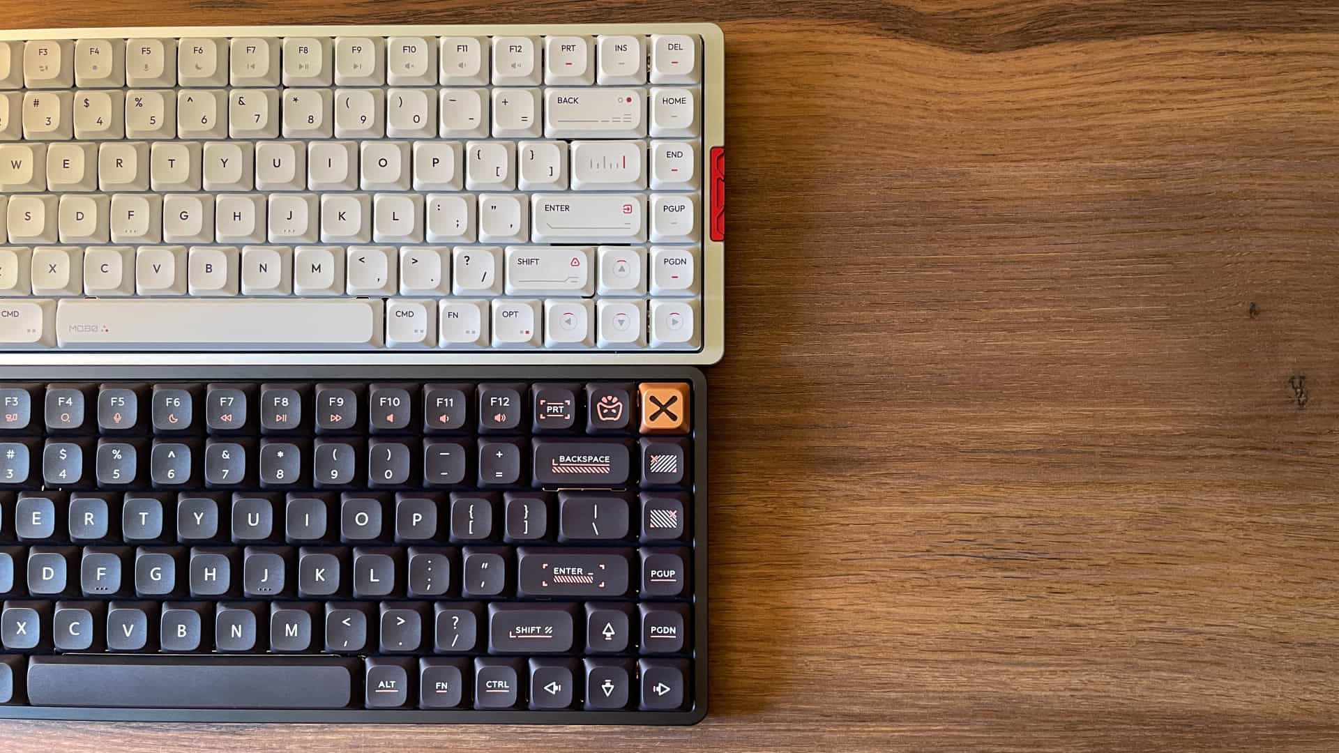 Side-by-side comparison of the IQUNIX Magi75 and MQ80 mechanical keyboards aligned to show their overall length difference.