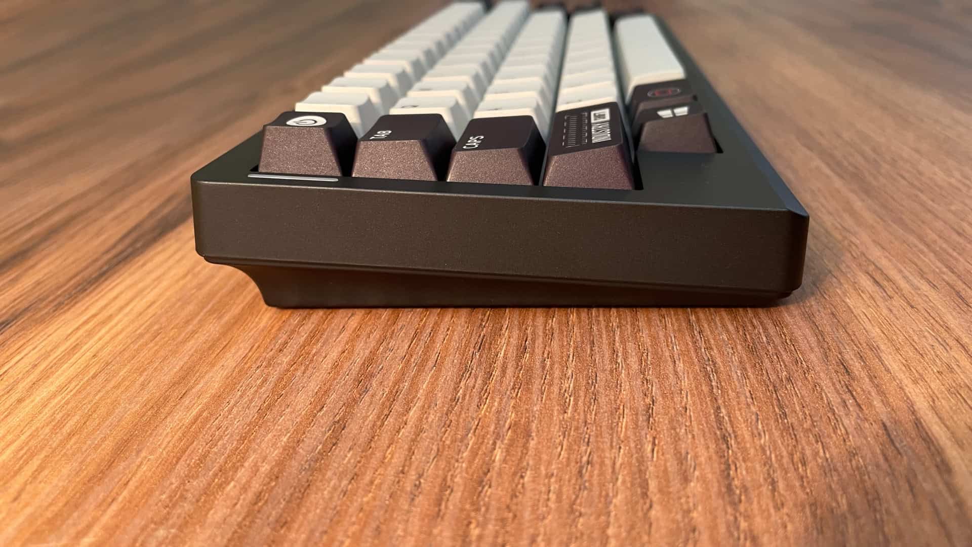 Side profile view of the Epomaker Hack59 mechanical keyboard, highlighting its height, case shape, and overall build thickness.