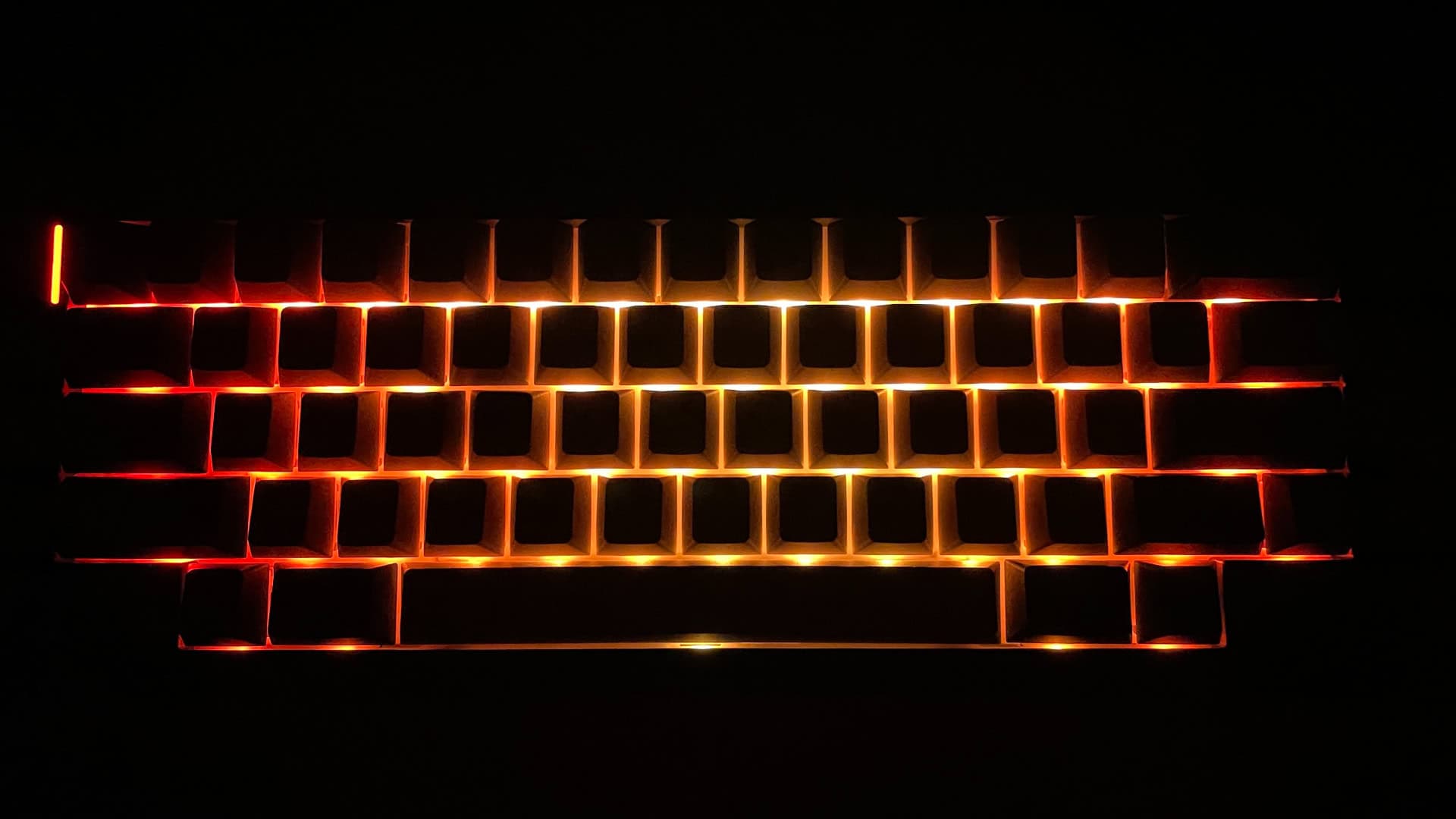 The Epomaker Hack59 mechanical keyboard with RGB backlighting turned on.