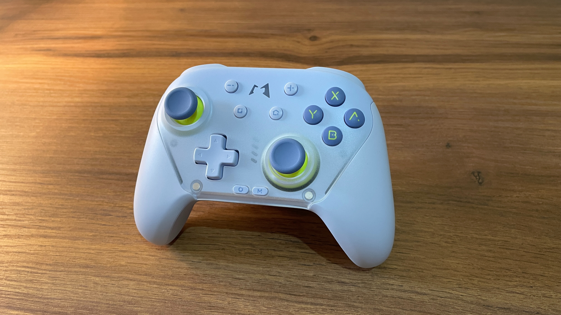 Product photo of the Mobapad Chitu 2 HD Silent Edition controller highlighting its exclusive light lavender body color with lemon-yellow accents on the ABXY buttons and analog sticks, emphasizing the fresh and playful design contrast.