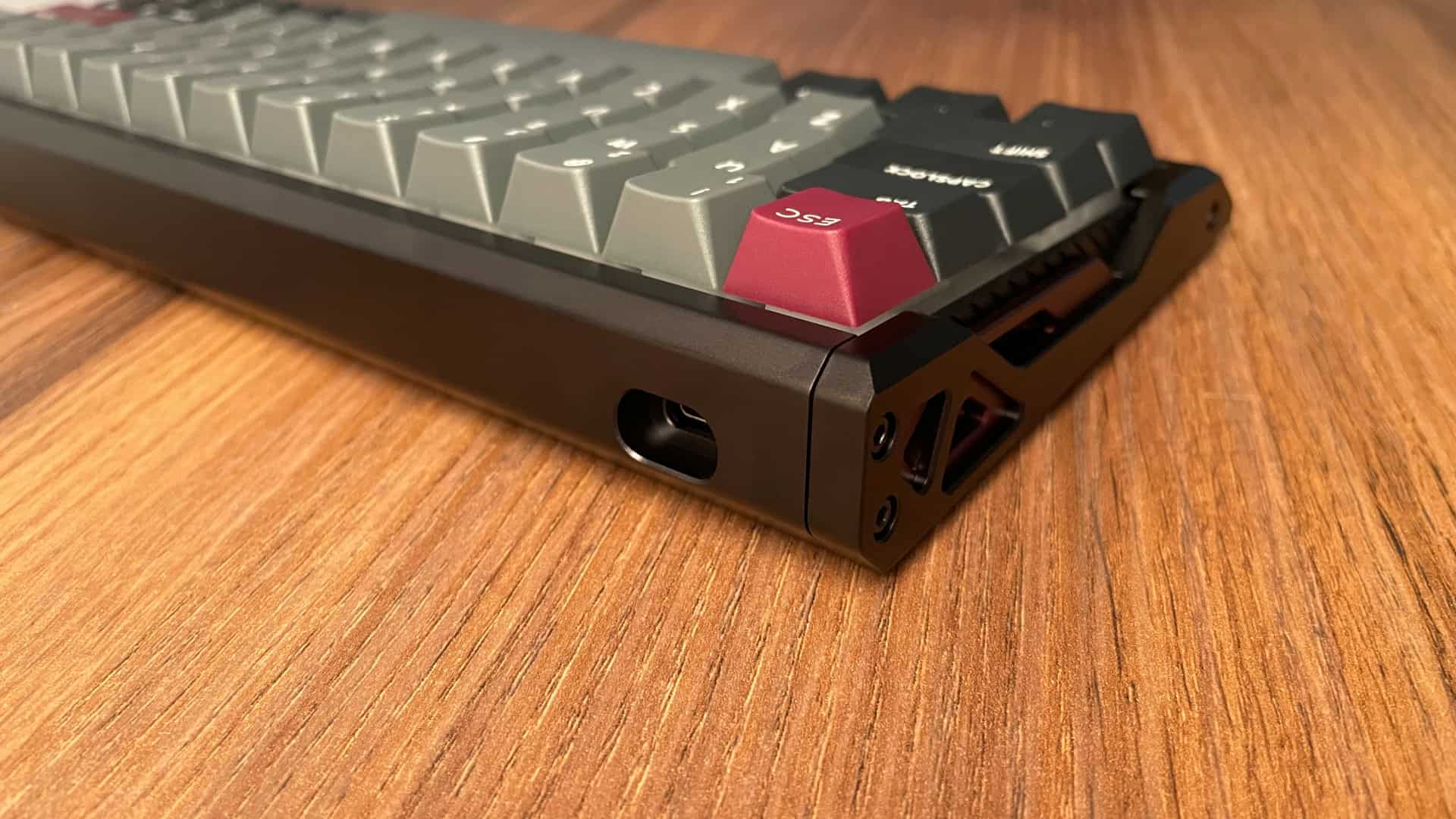 Rear view of the IQUNIX EV63 mechanical keyboard showing a single USB-C port positioned on the left side of the back edge.