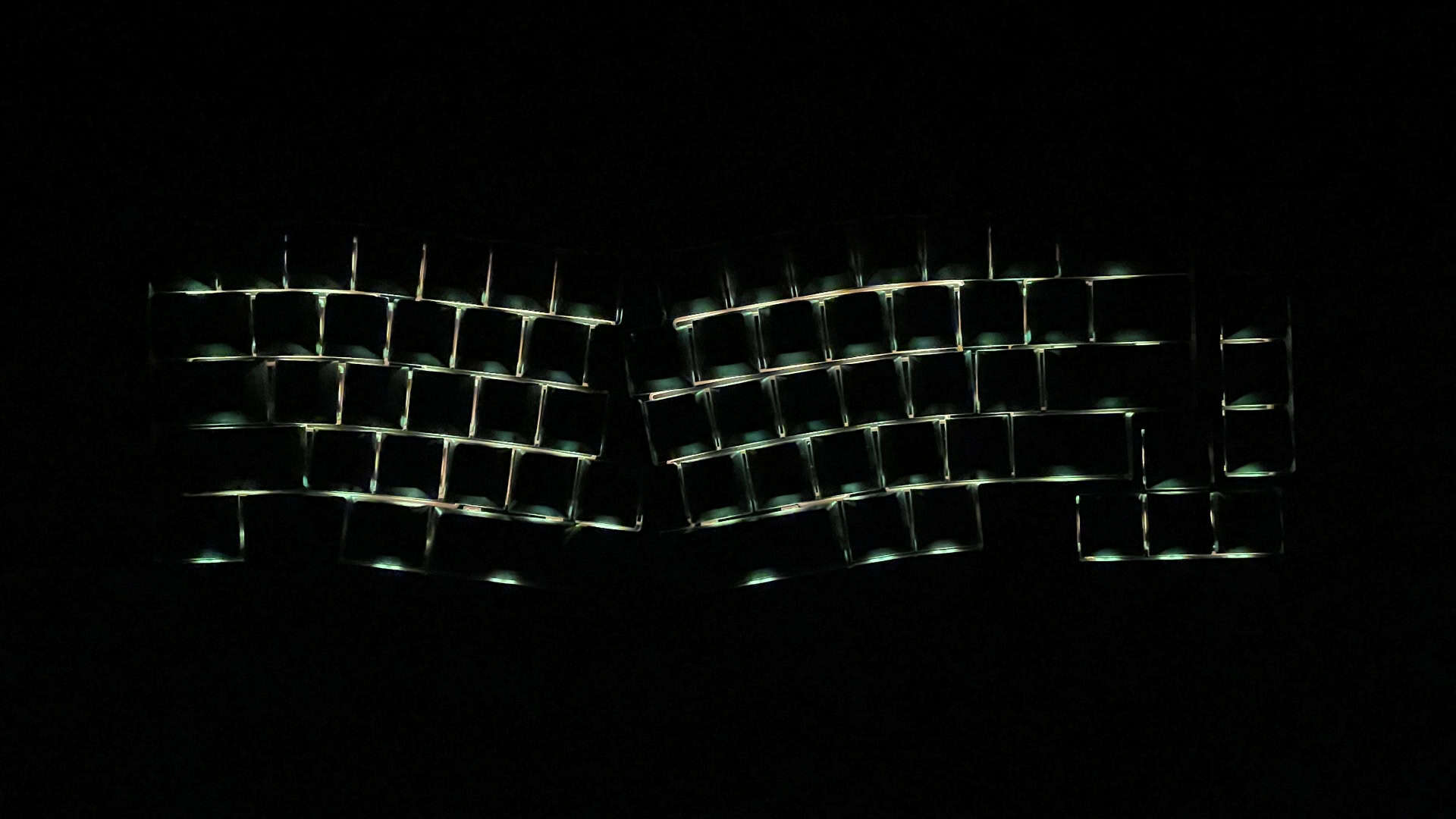 Alt Text:
The Epomaker Tide Alice mechanical keyboard shown in a dark environment with its RGB backlight illuminated, highlighting the lighting effects and key legends.
