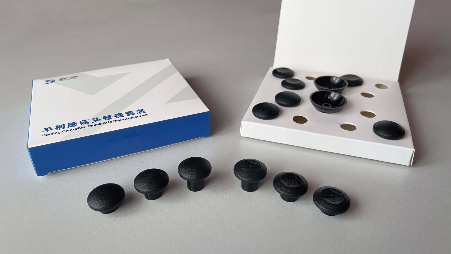 Close-up of the ZD “FPS-style” interchangeable thumbsticks with detailed finish and design.
