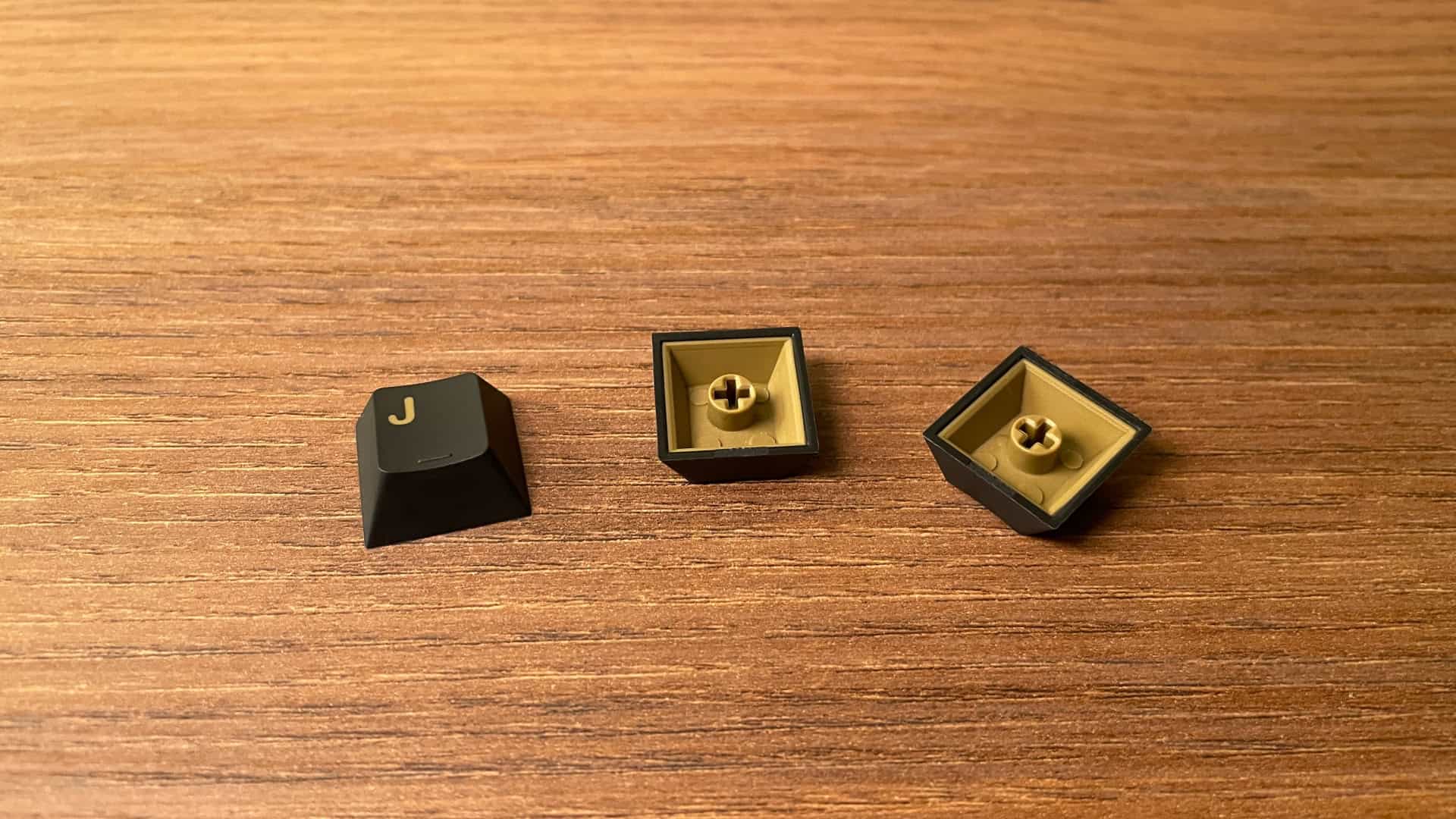 Close-up view of the keycaps on the Epomaker Tide Alice mechanical keyboard, highlighting their texture, legends, and surface finish.