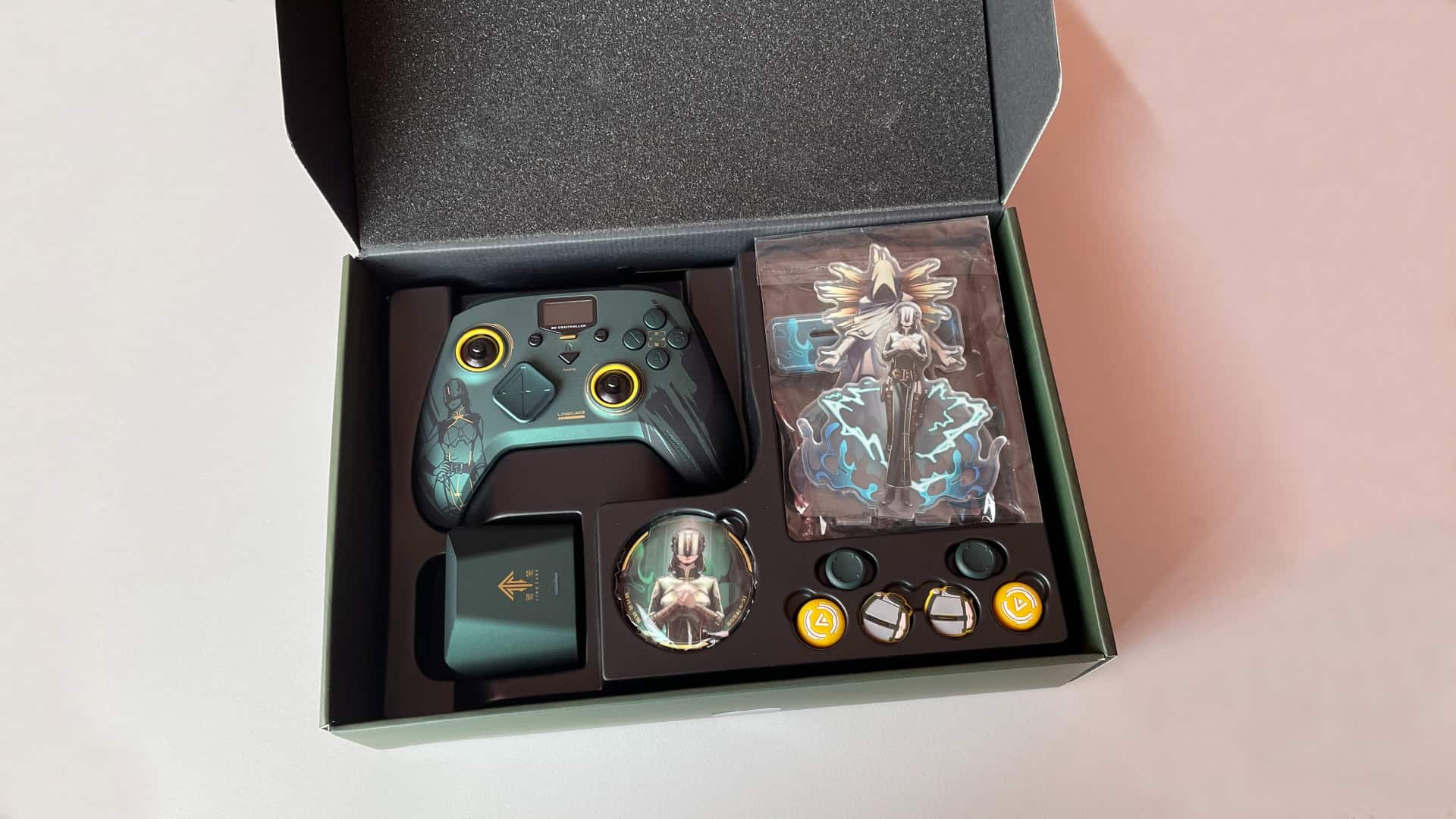The ZD Classic Legend Ling Cage Limited Edition controller package with the box opened, revealing the controller and included accessories inside.