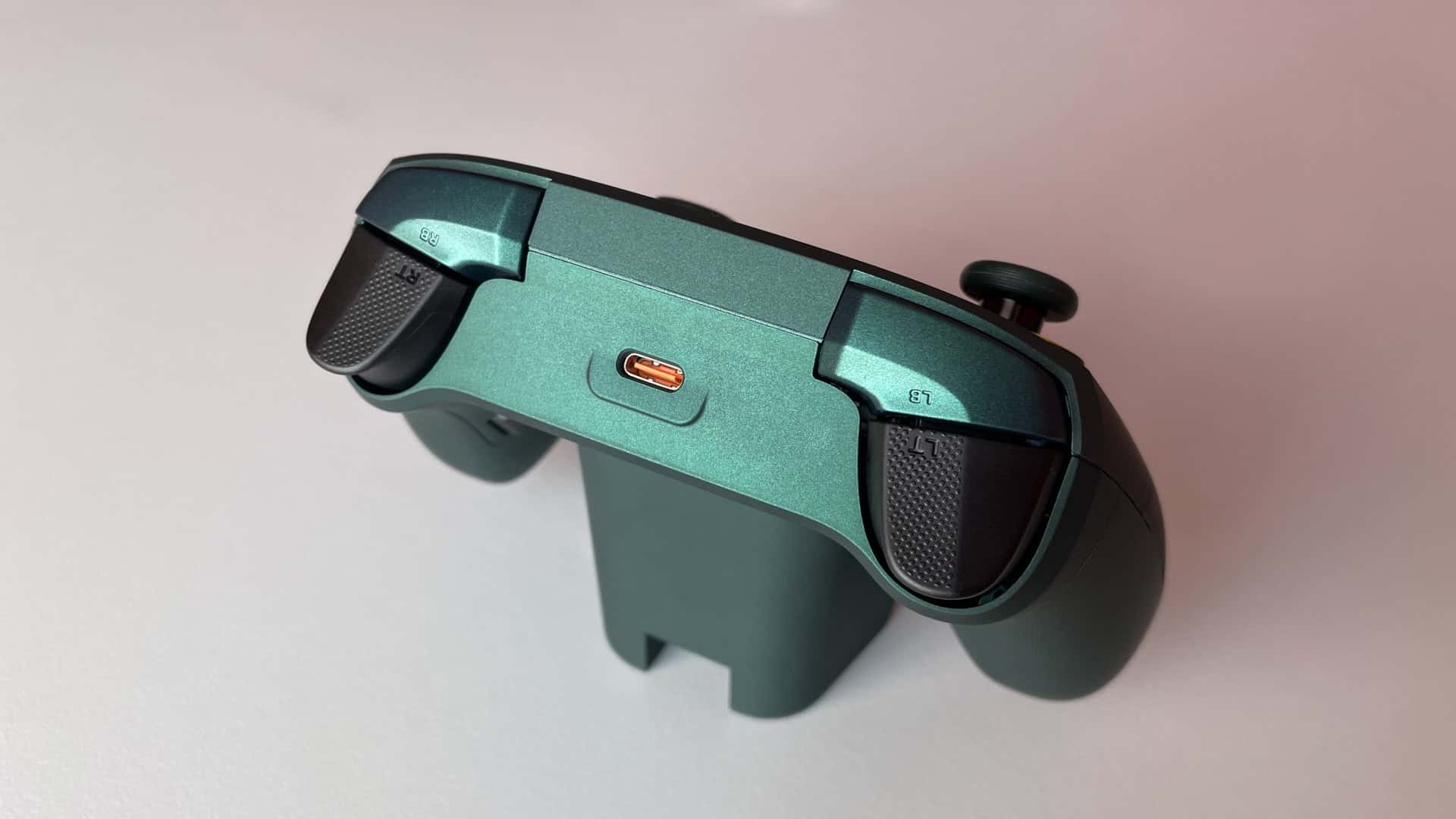 Close-up view of the shoulder bumpers and triggers on the ZD Classic Legend Ling Cage Limited Edition controller, highlighting their shape, placement, and finish.