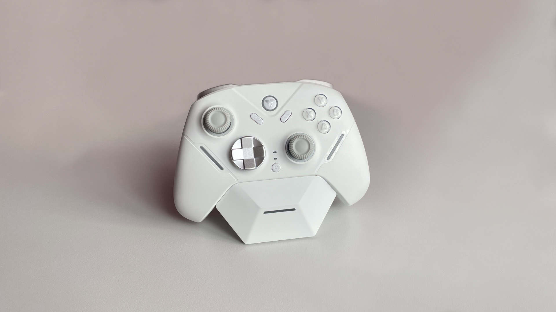 Fantech Zenith Pro controller placed on its charging dock, showing the full setup.