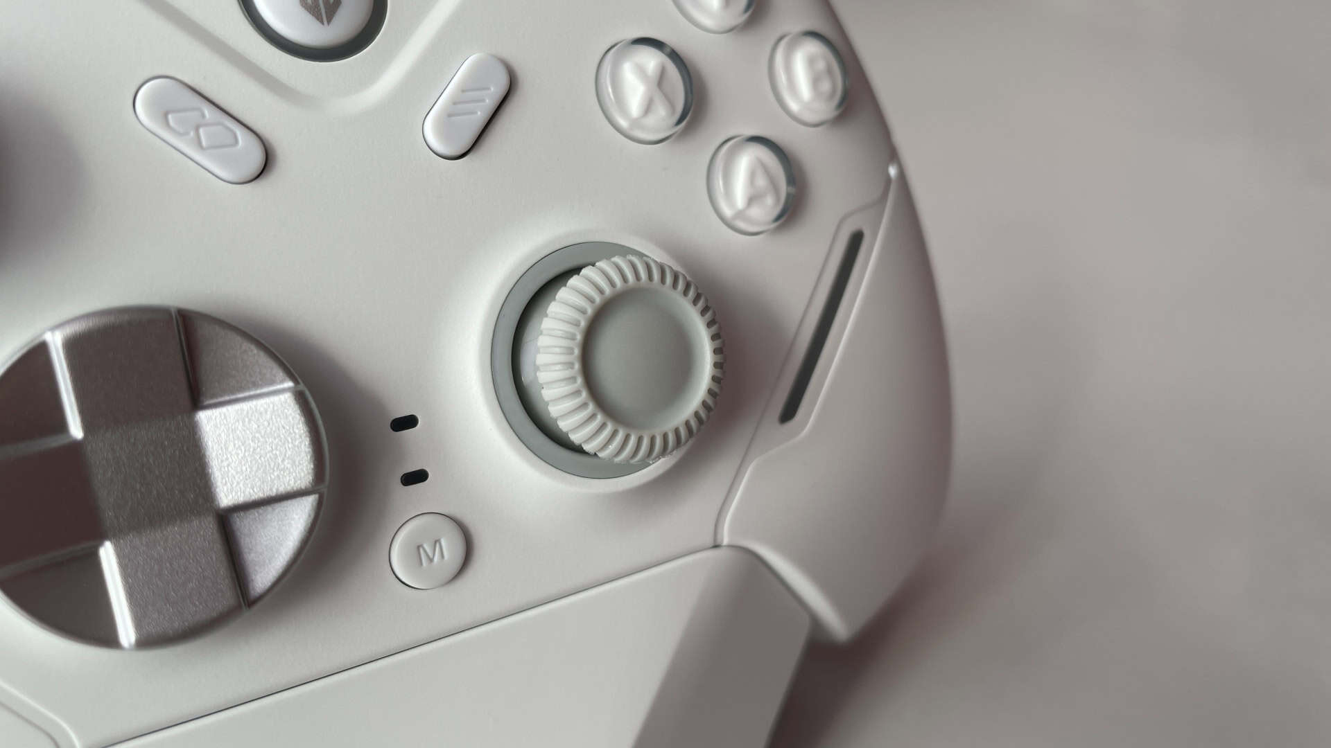 Close-up of the Fantech Zenith Pro controller thumbsticks showing their design, surface texture, and build quality.