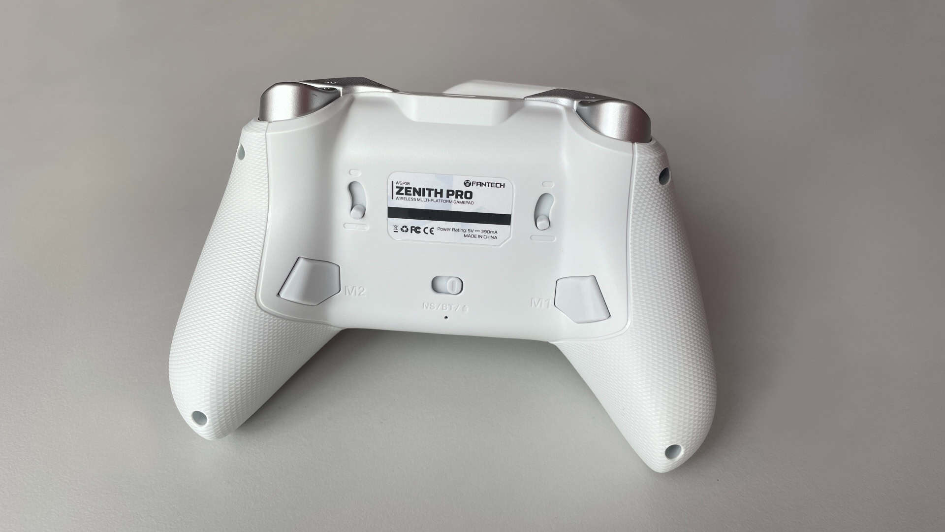 Rear view of the Fantech Zenith Pro controller showing the additional programmable back buttons integrated into the grip area.