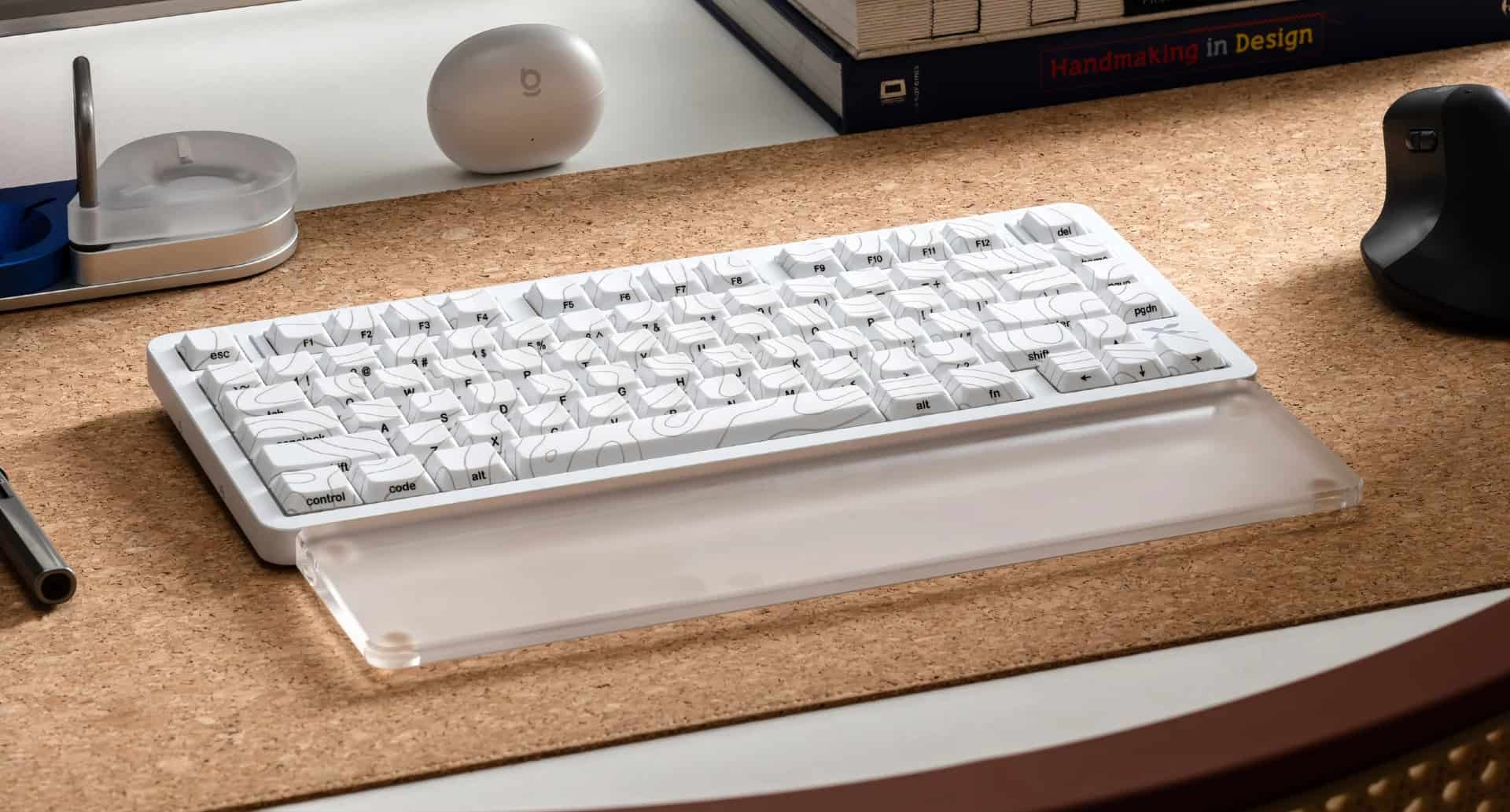 White XVX L75 Air low-profile mechanical keyboard featuring topographic keycaps with a unique textured design and minimalist aesthetic.