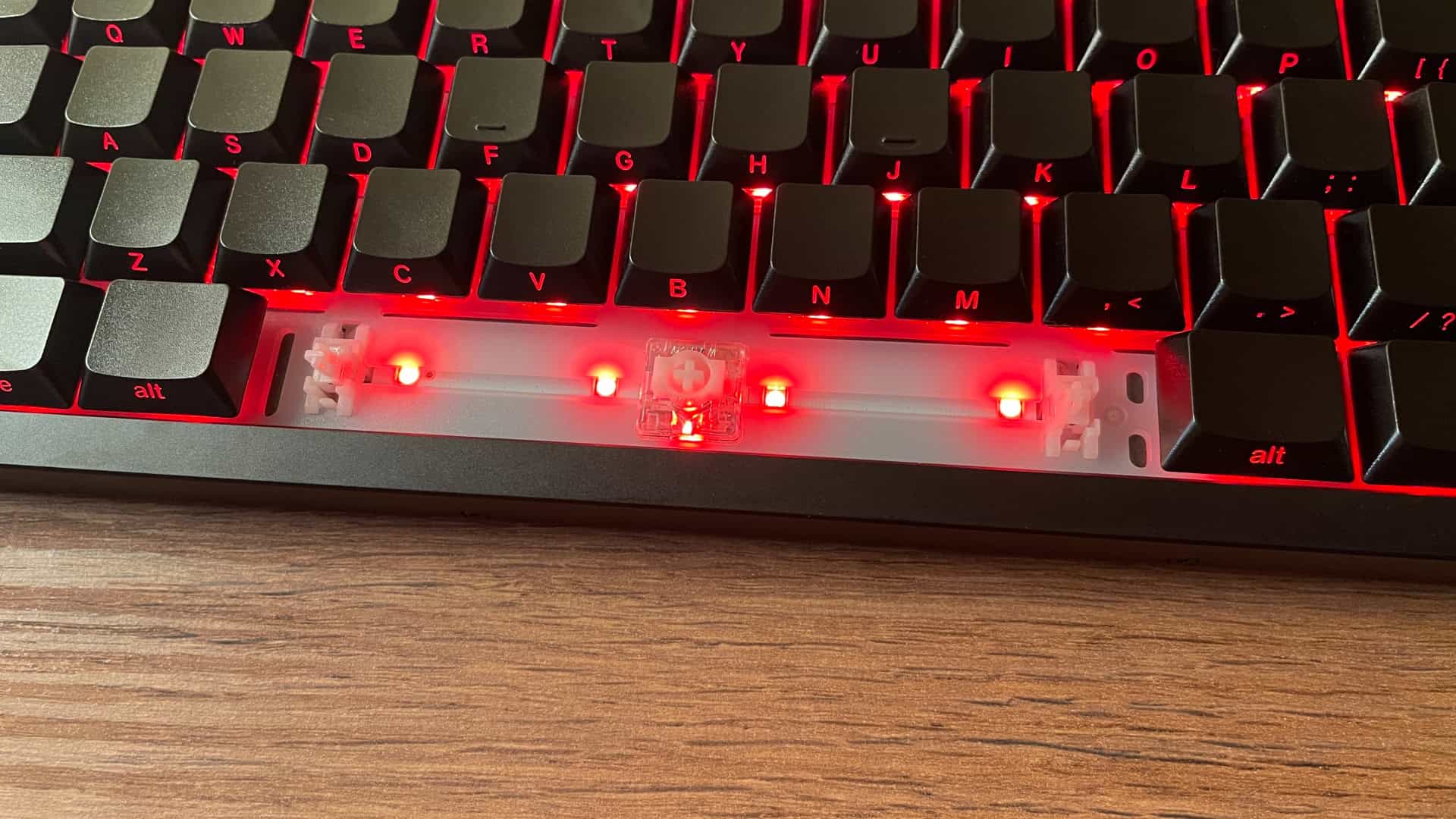 Close-up view of the XVX L75 Air spacebar with evenly distributed RGB lighting, highlighting the uniform glow created by multiple LEDs beneath the key.