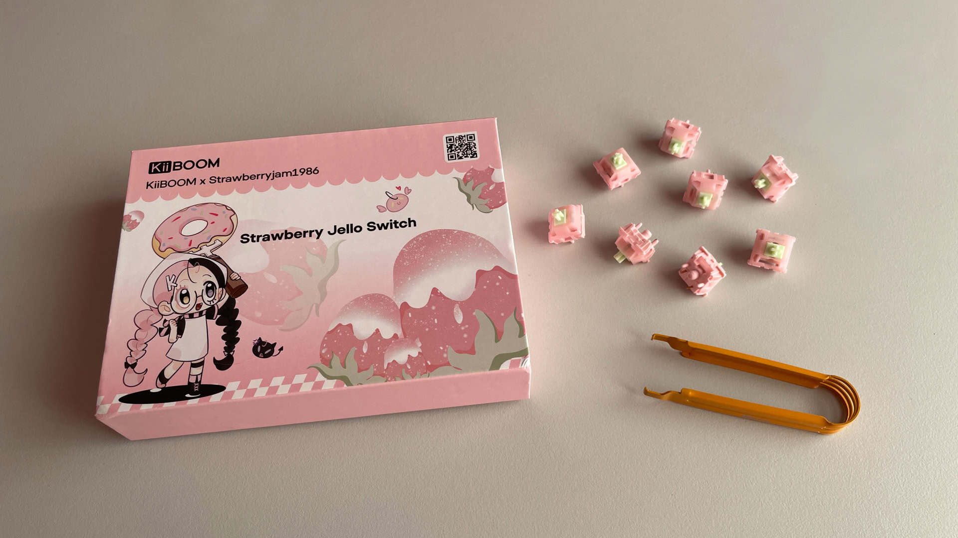 Retail packaging for the KiiBoom x Strawberryjam1986 Strawberry Jello mechanical keyboard switches.