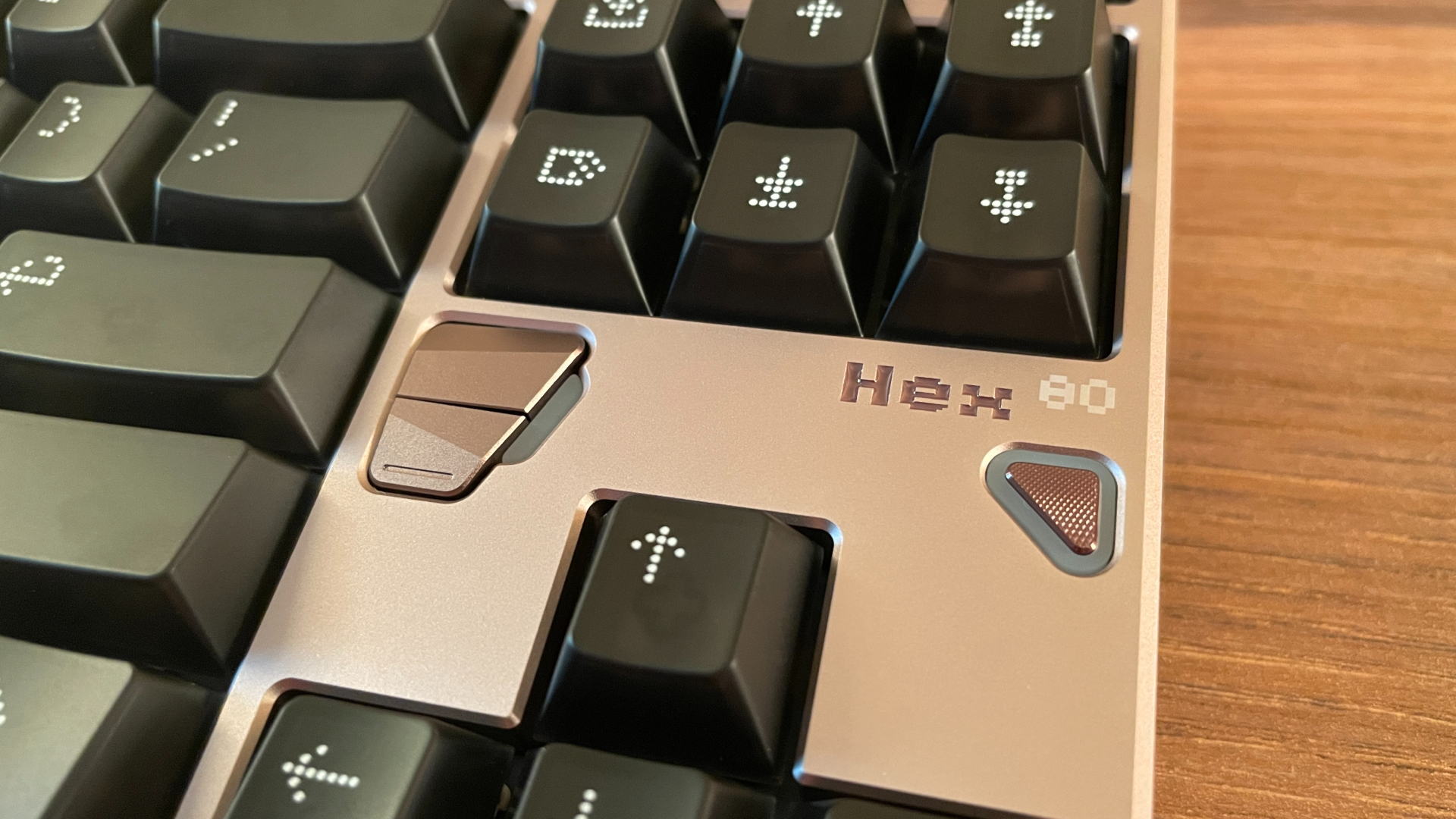 ATK x QwertyKeys Hex80 Review – Endgame Hall Effect Keyboard? 11 Close-up of the three additional buttons below the navigation cluster, showing their distinctive design alongside the RGB light elements and Hex80 branding.