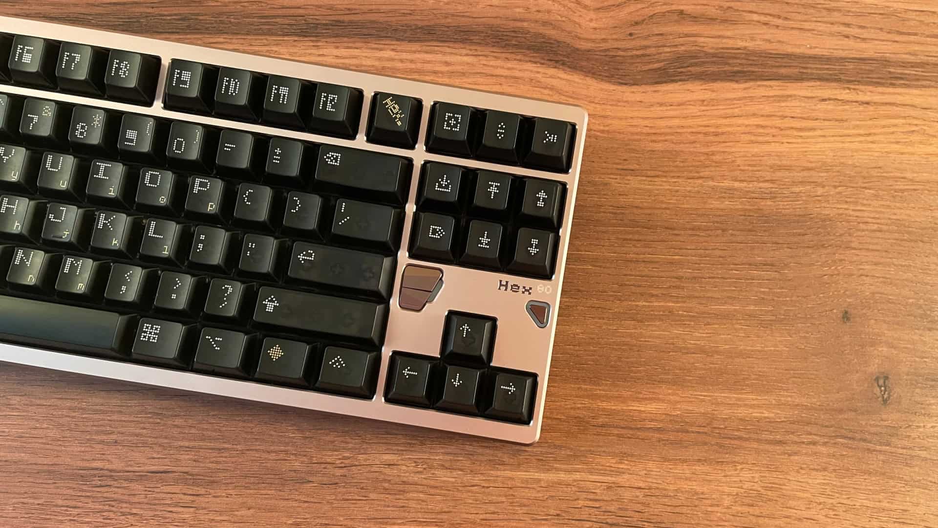 The ATK x QwertyKeys Hex80 Hall Effect keyboard shown from a stylish angled view, highlighting its aluminum case and overall design.