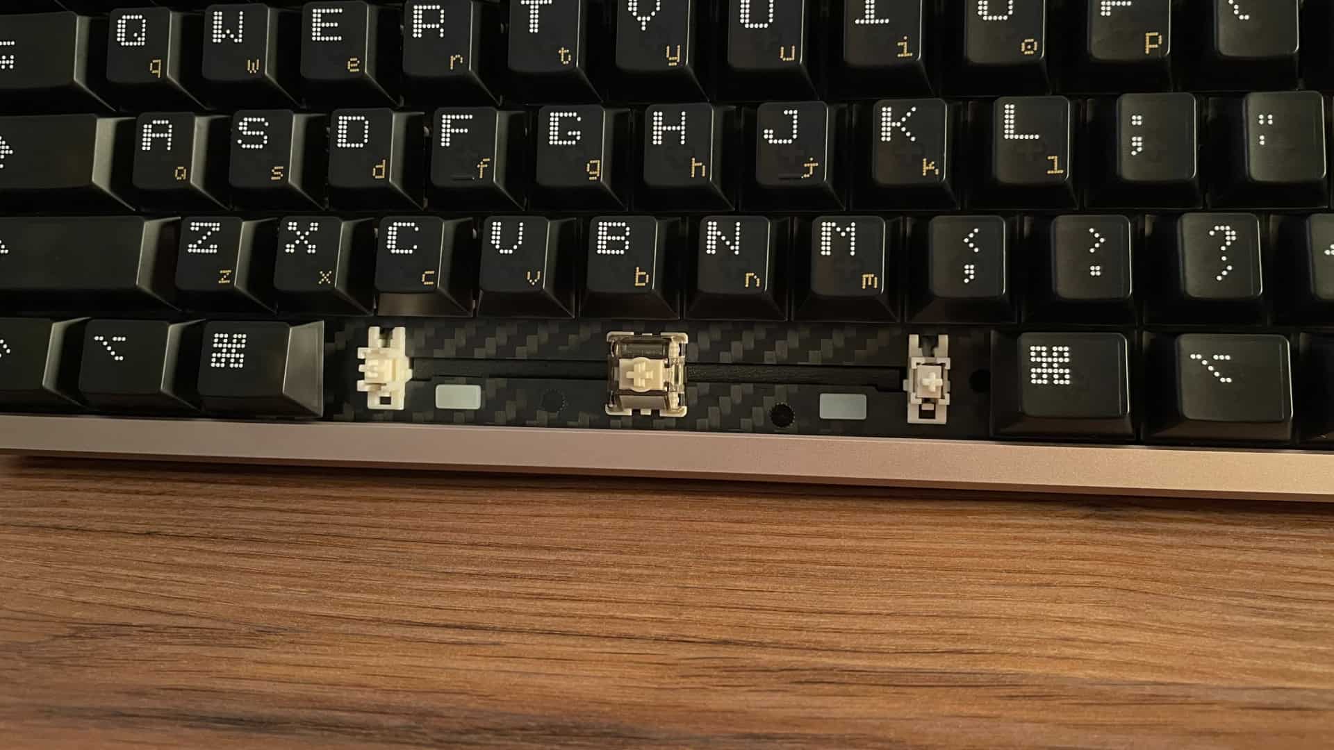 Additional RGB LEDs positioned beneath the spacebar on the ATK x QwertyKeys Hex80.