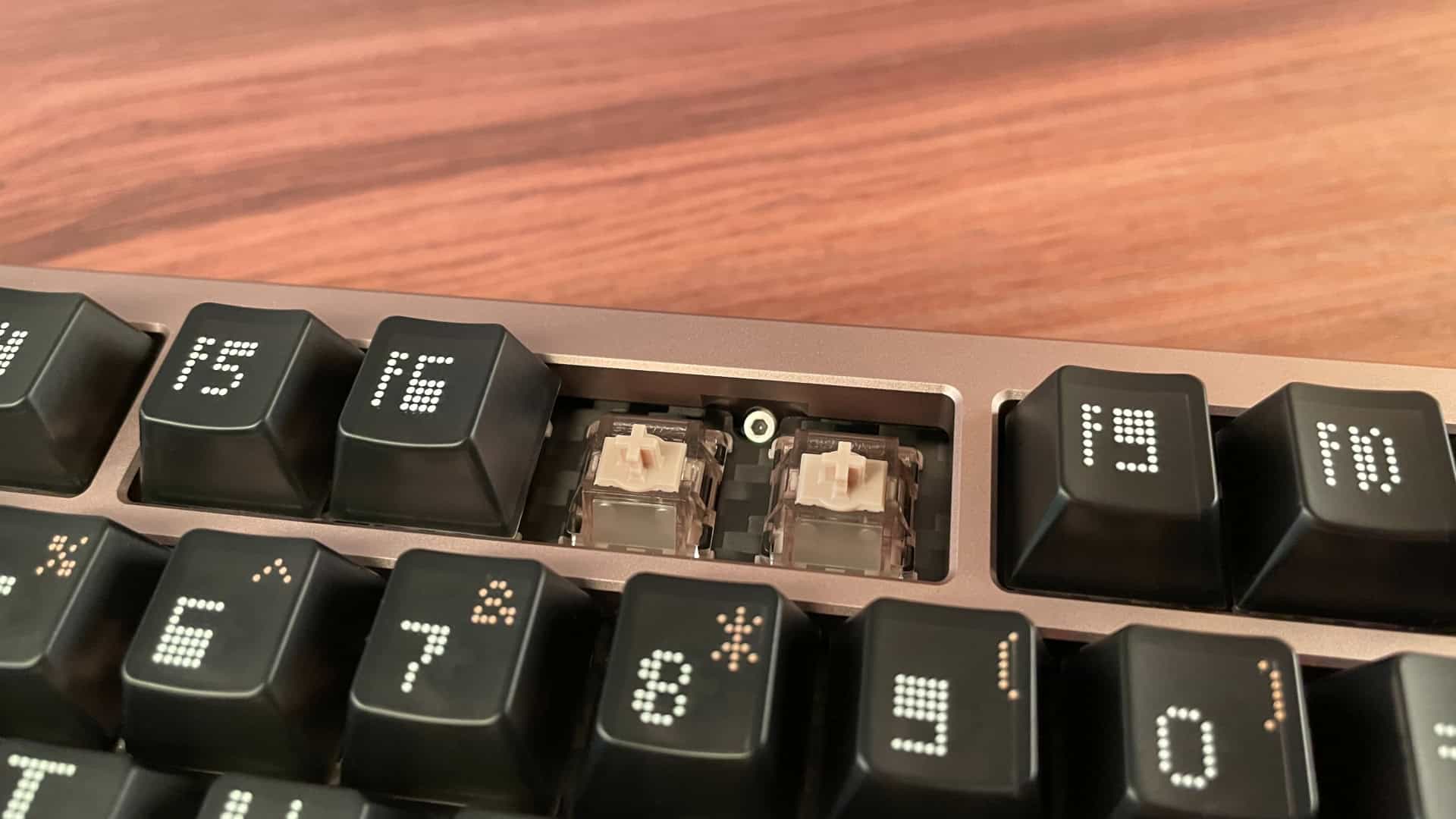 The ATK x QwertyKeys Hex80 showing its hidden screw design with no visible screws on the exterior of the case.