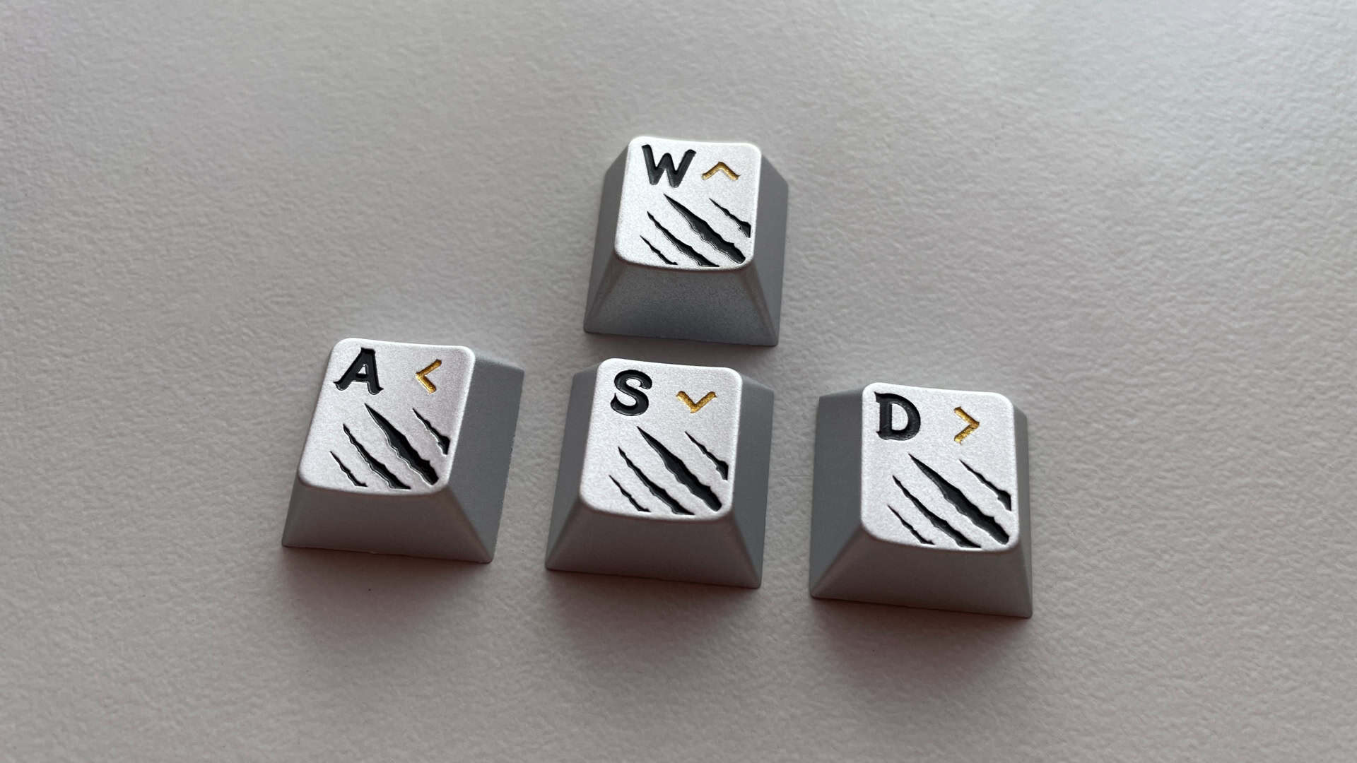 XVX Holy Beasts Series White Tiger aluminum WASD keycaps.