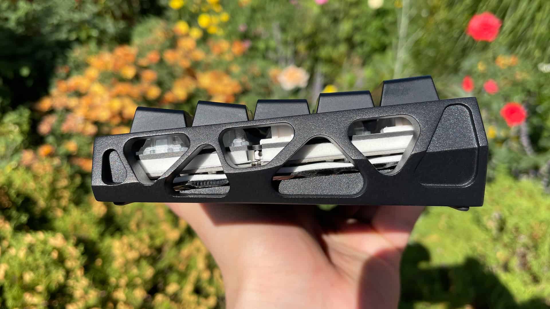 Side view of the XVX Trooper63 HE showing its case profile and exterior details.