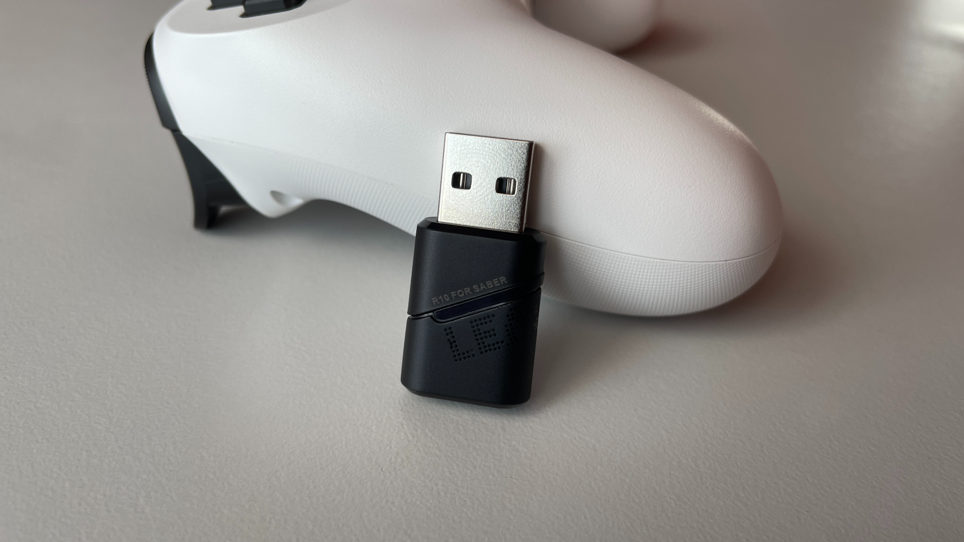 Leadjoy Saber Plus Review – $60 Symmetrical Controller with JS13 Pro TMR Sticks 5 R10 2.4GHz wireless dongle for the Leadjoy Saber Plus.