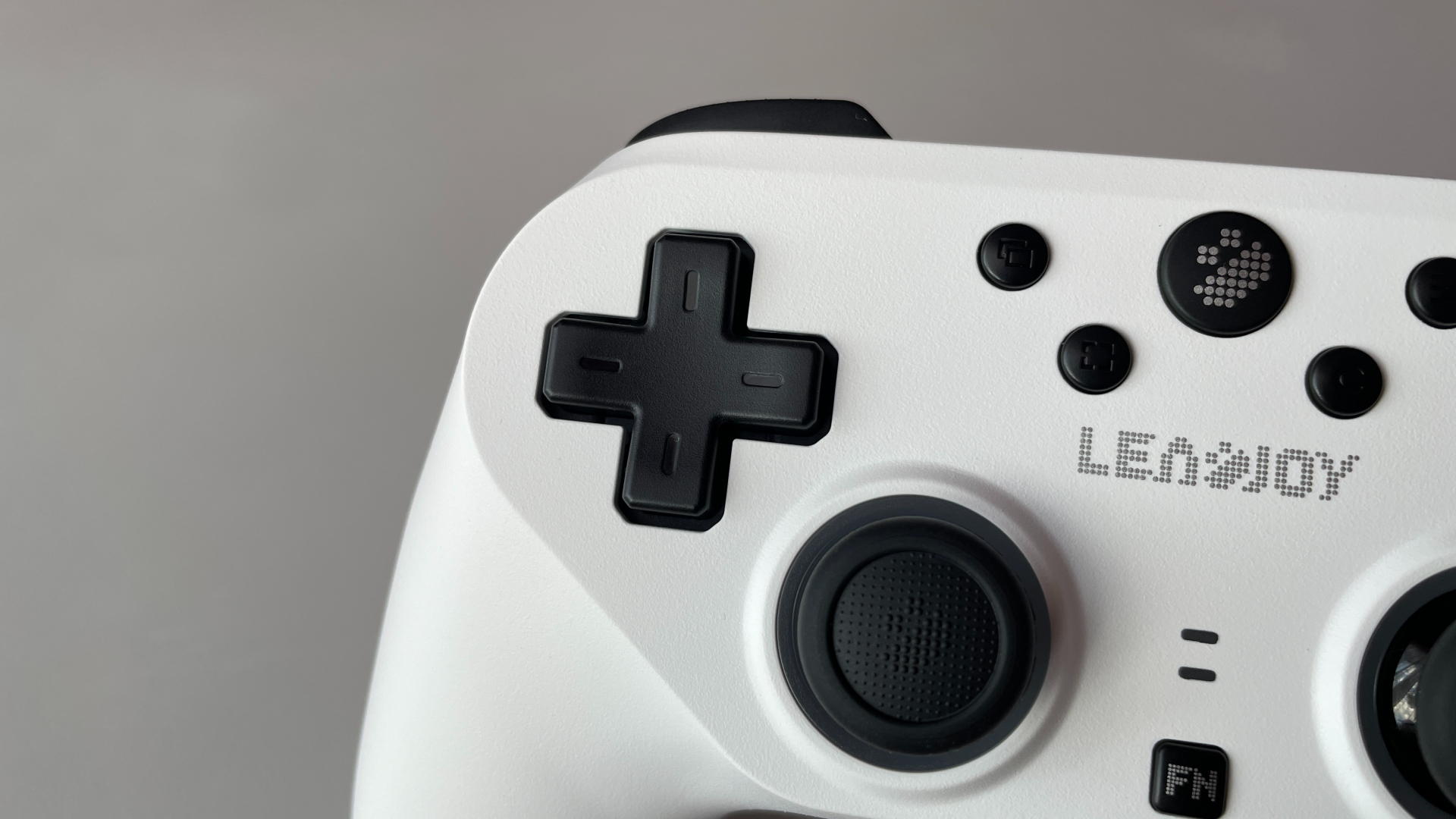 Leadjoy Saber Plus Review – $60 Symmetrical Controller with JS13 Pro TMR Sticks 12 Close-up of the Leadjoy Saber Plus classic cross-shaped membrane D-pad.