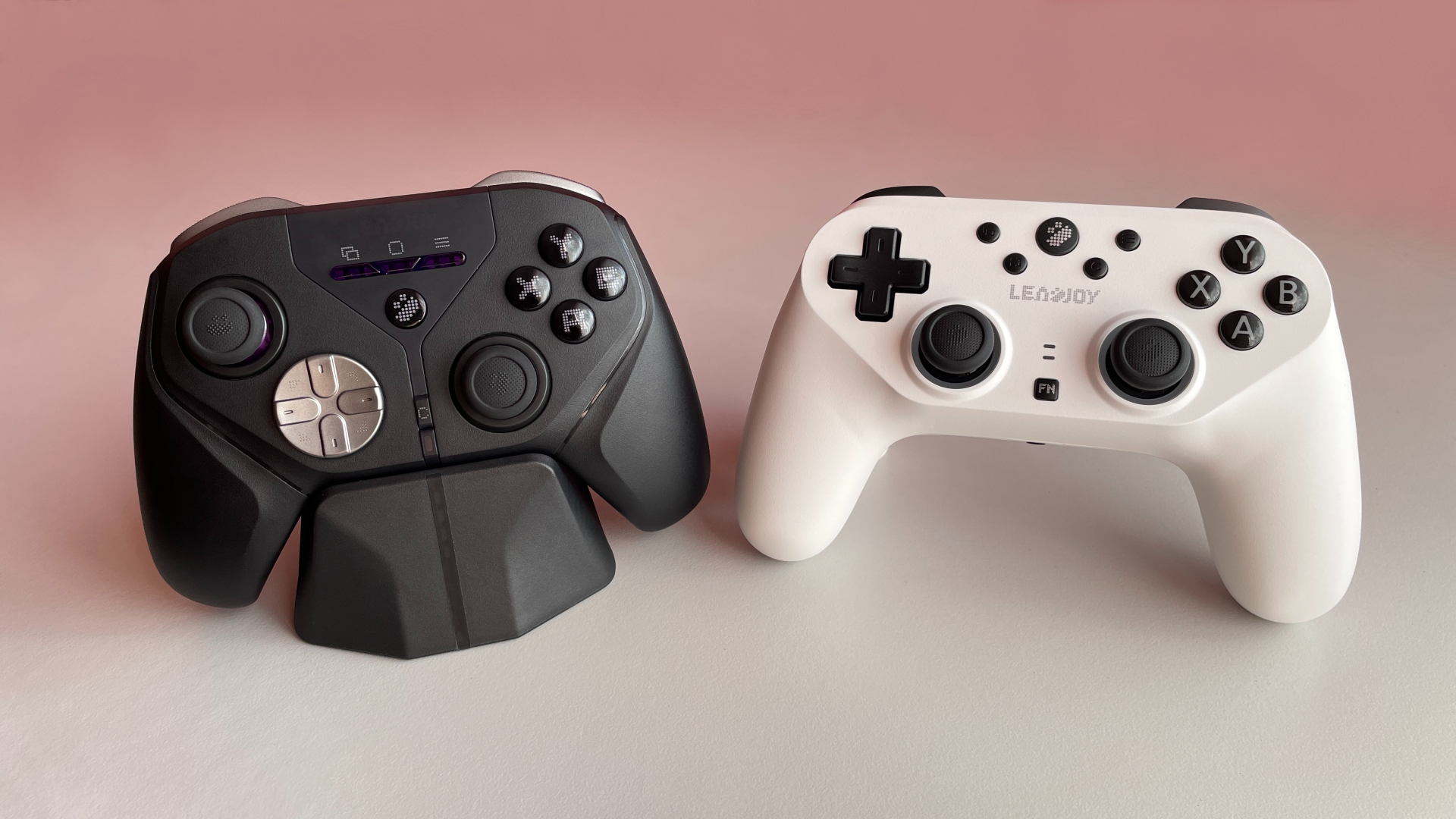 Leadjoy Xeno Plus vs Leadjoy Saber Plus: Same DNA, Same $60Price, Different Paths 3 Leadjoy Xeno Plus and Leadjoy Saber Plus controllers placed side by side.