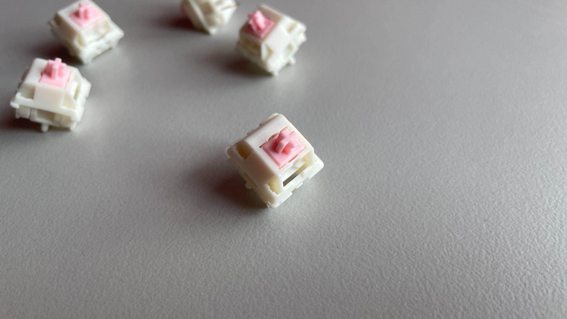 Close-up view of an Epomaker Roseveil mechanical keyboard switch.