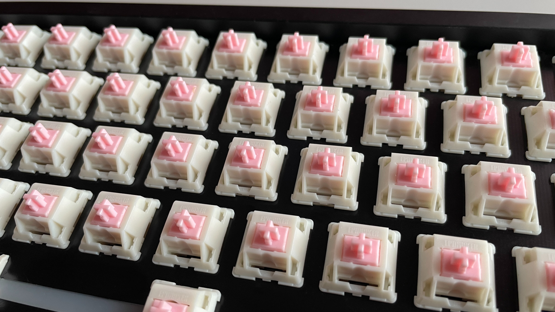 Close-up view of Epomaker Roseveil switches installed in an Epomaker Galaxy68 mechanical keyboard.