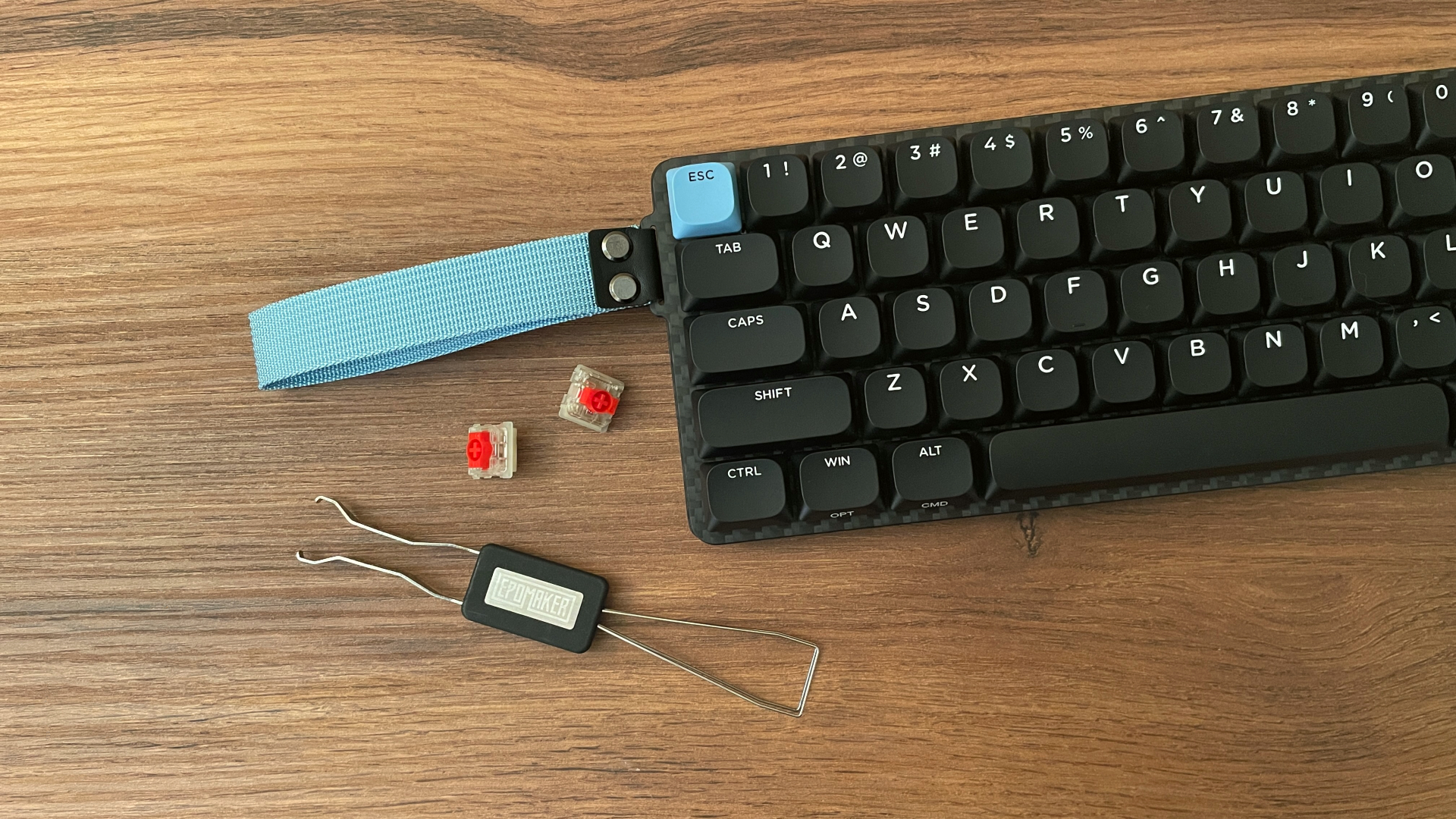 Epomaker Carbon60 Review – A Portable Low-Profile Keyboard with a Carbon Fiber Case 19 Epomaker Carbon60 low-profile mechanical keyboard with its distinctive carbon fiber case and compact 60% layout.