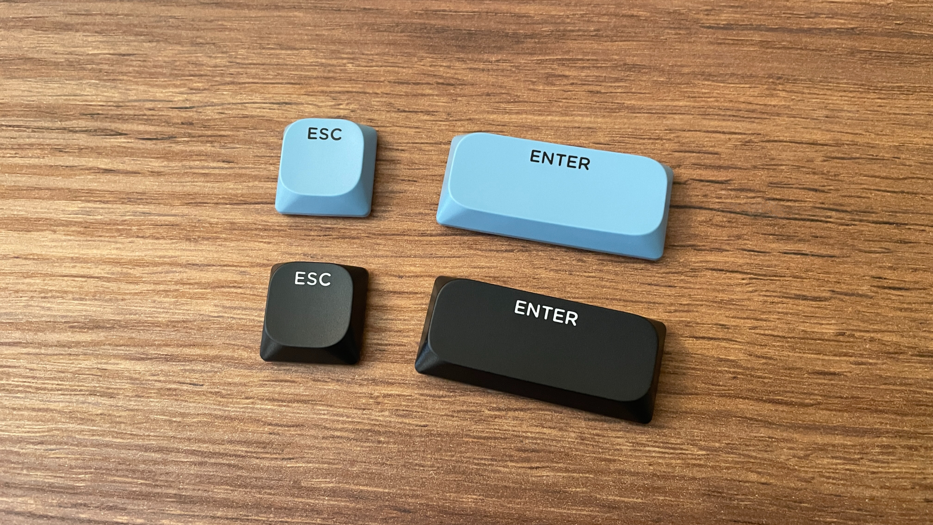 Epomaker Carbon60 Review – A Portable Low-Profile Keyboard with a Carbon Fiber Case 16 Epomaker Carbon60 keycaps showing the accent Enter and Escape keys alongside the more understated replacement options included in the box.