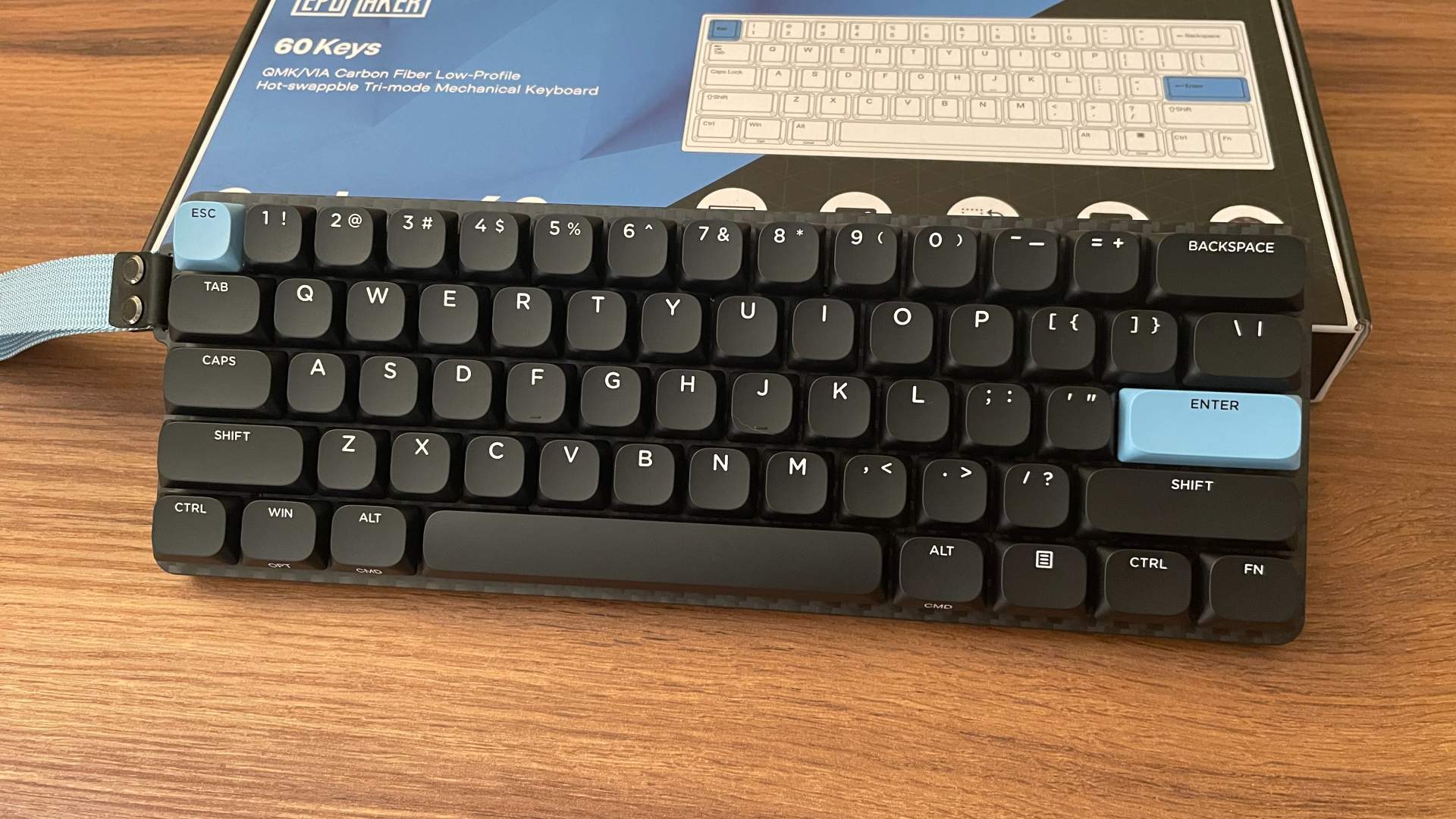 Epomaker Carbon60 Review – A Portable Low-Profile Keyboard with a Carbon Fiber Case 18 Epomaker Carbon60 low-profile mechanical keyboard with its carbon fiber case and compact 60% layout.