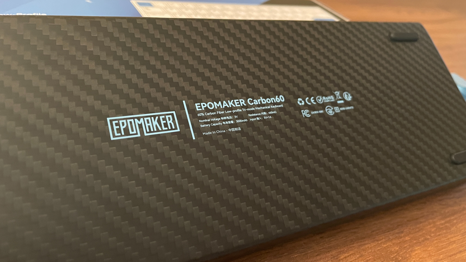 Epomaker Carbon60 Review – A Portable Low-Profile Keyboard with a Carbon Fiber Case 9 Close-up of the woven carbon fiber surface on the Epomaker Carbon60 case.