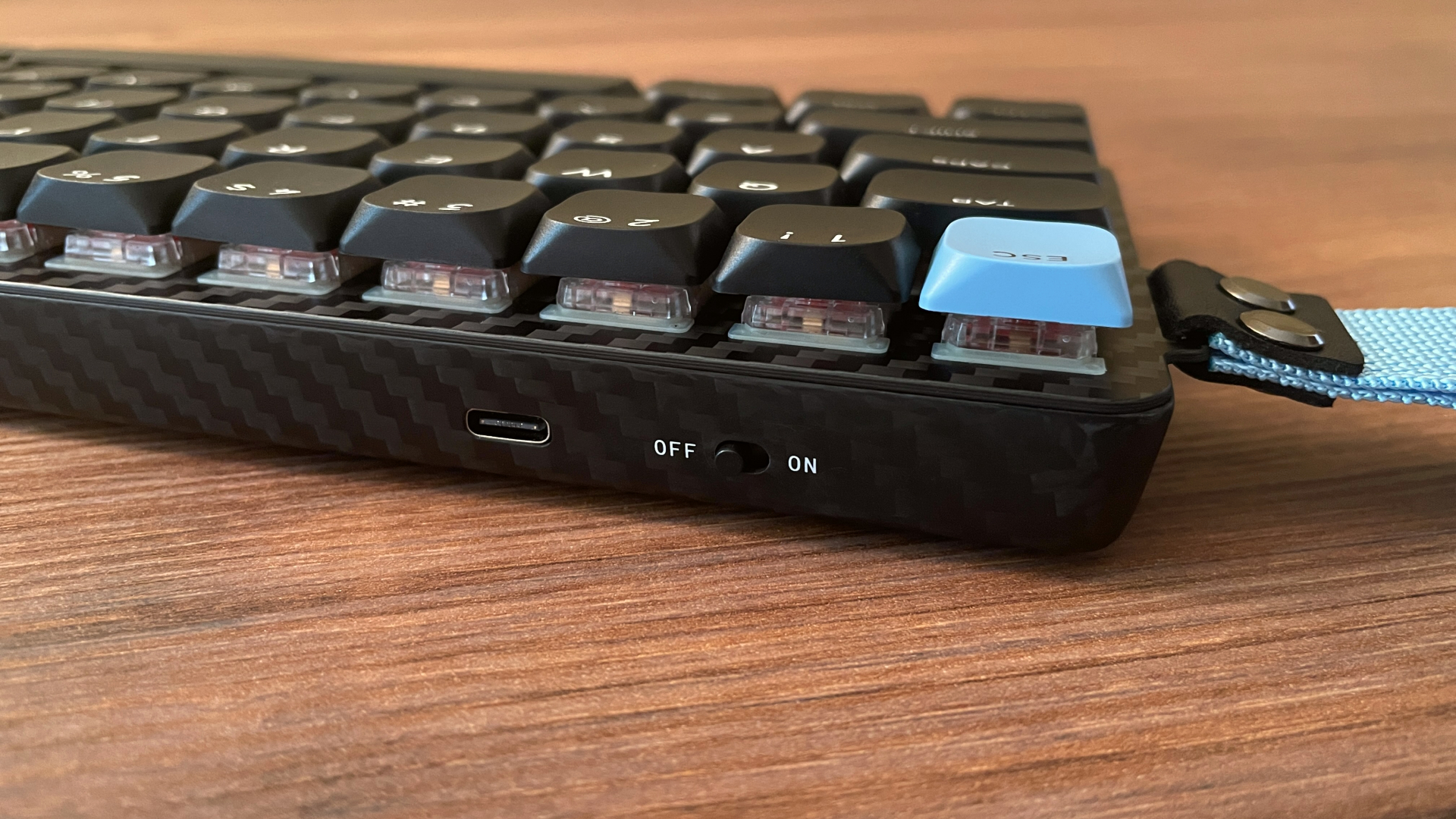 Epomaker Carbon60 Review – A Portable Low-Profile Keyboard with a Carbon Fiber Case 13 On/off power switch on the Epomaker Carbon60 low-profile mechanical keyboard.