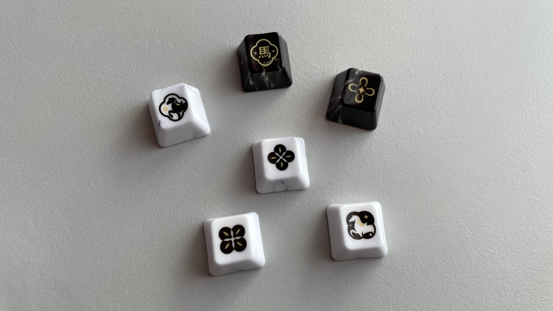 XVX Ceramic Keycaps Review: Year of the Horse Keycap Set 16 Novelty keycaps from the XVX Year of the Horse ceramic keycap set.