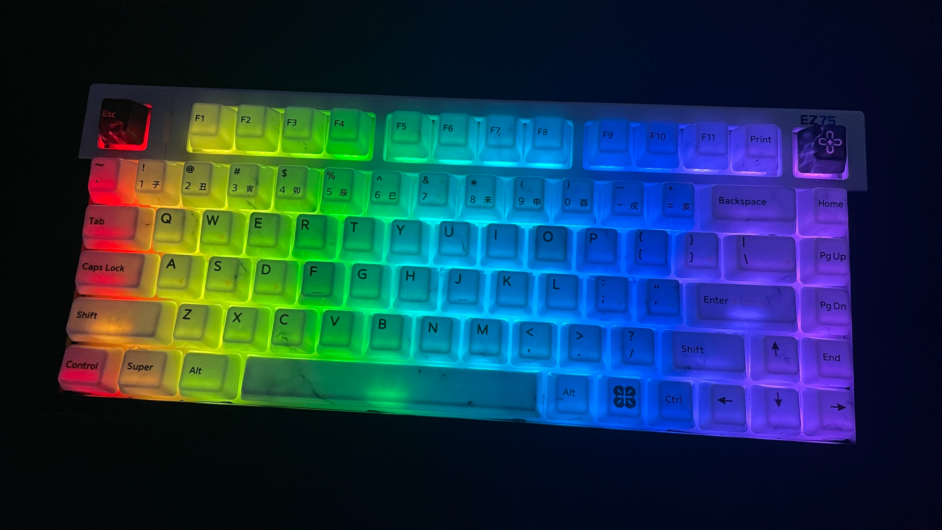 XVX Ceramic Keycaps Review: Year of the Horse Keycap Set 18 XVX Year of the Horse ceramic keycaps on a keyboard in the dark, with backlighting shining through the ceramic.