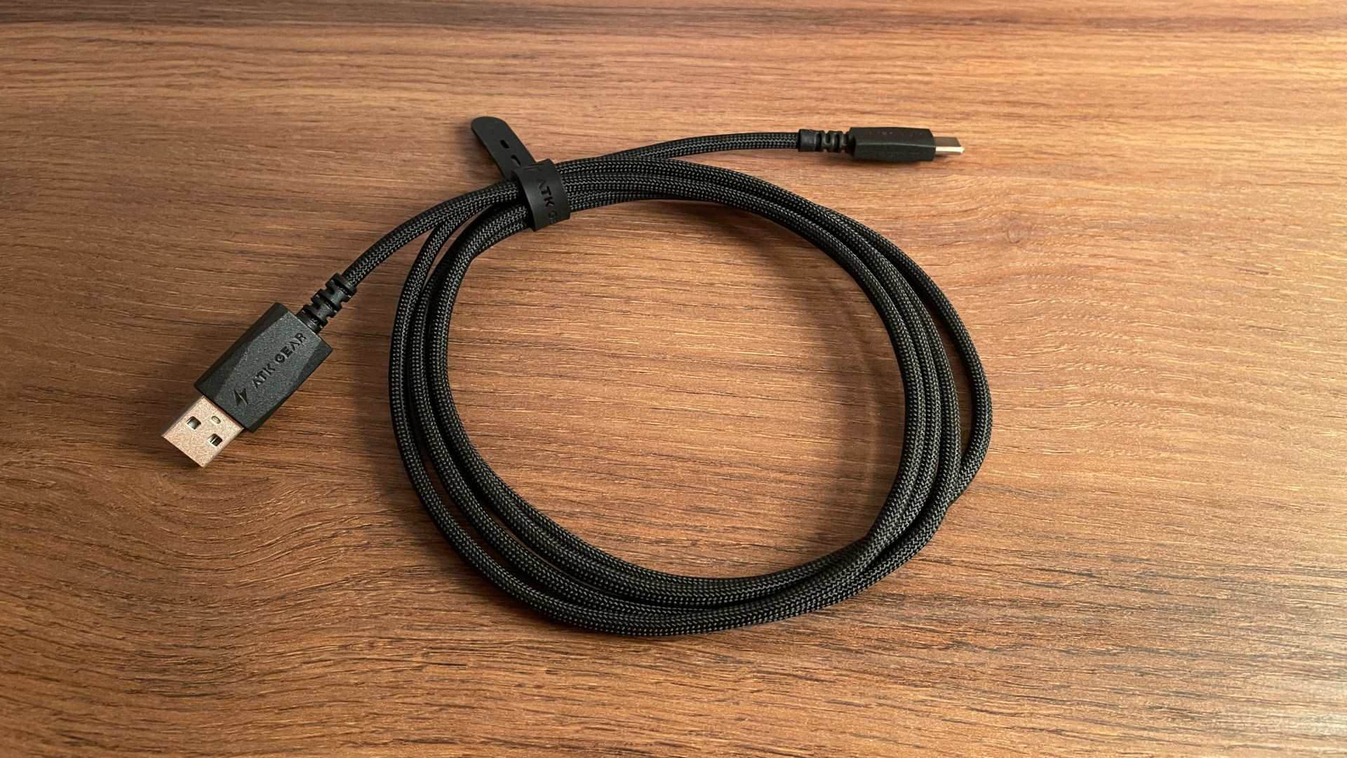 The USB-C cable included with the ATK Phantom gaming mouse.