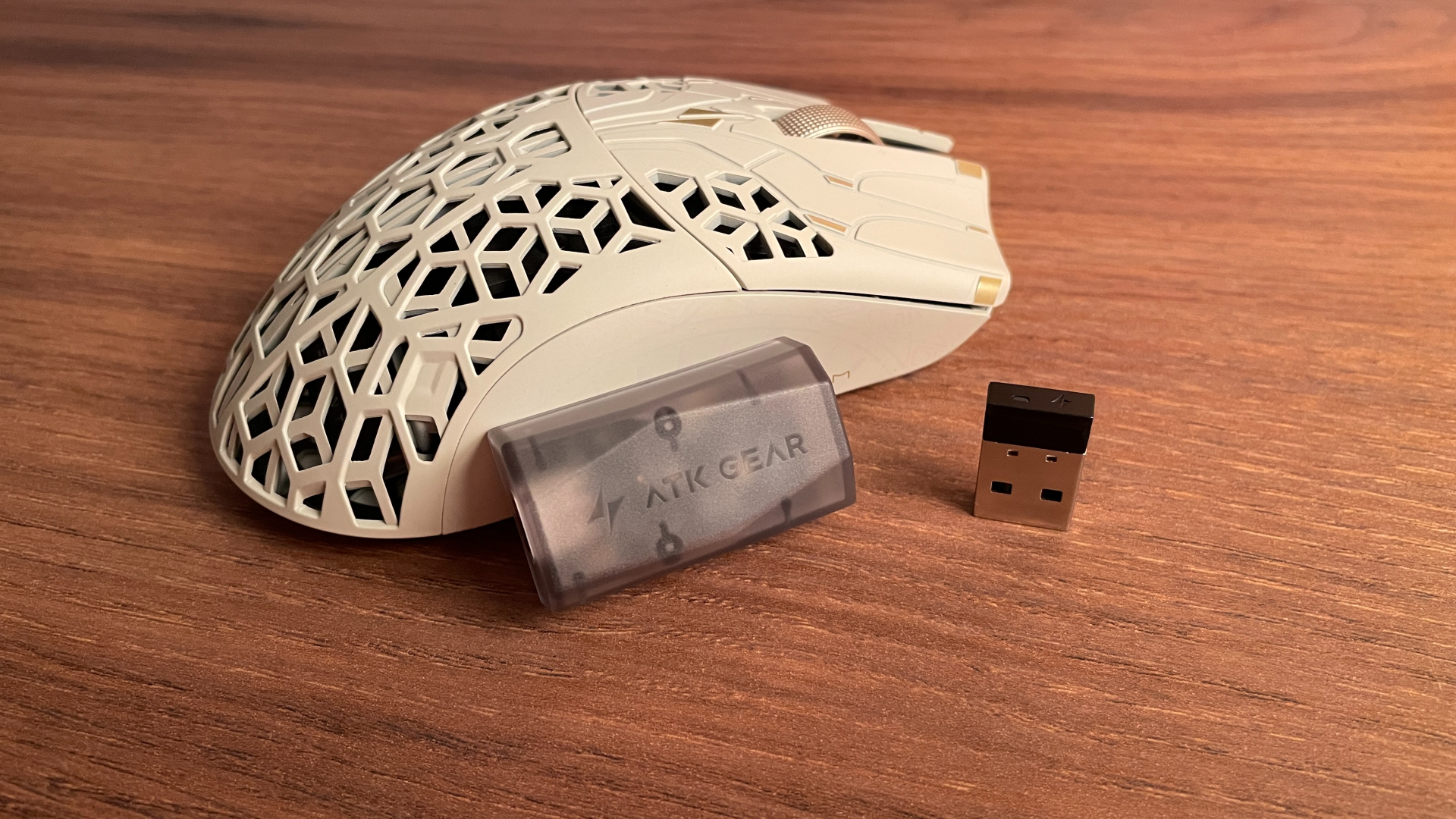 The two 2.4 GHz wireless dongles included with the ATK Phantom gaming mouse.