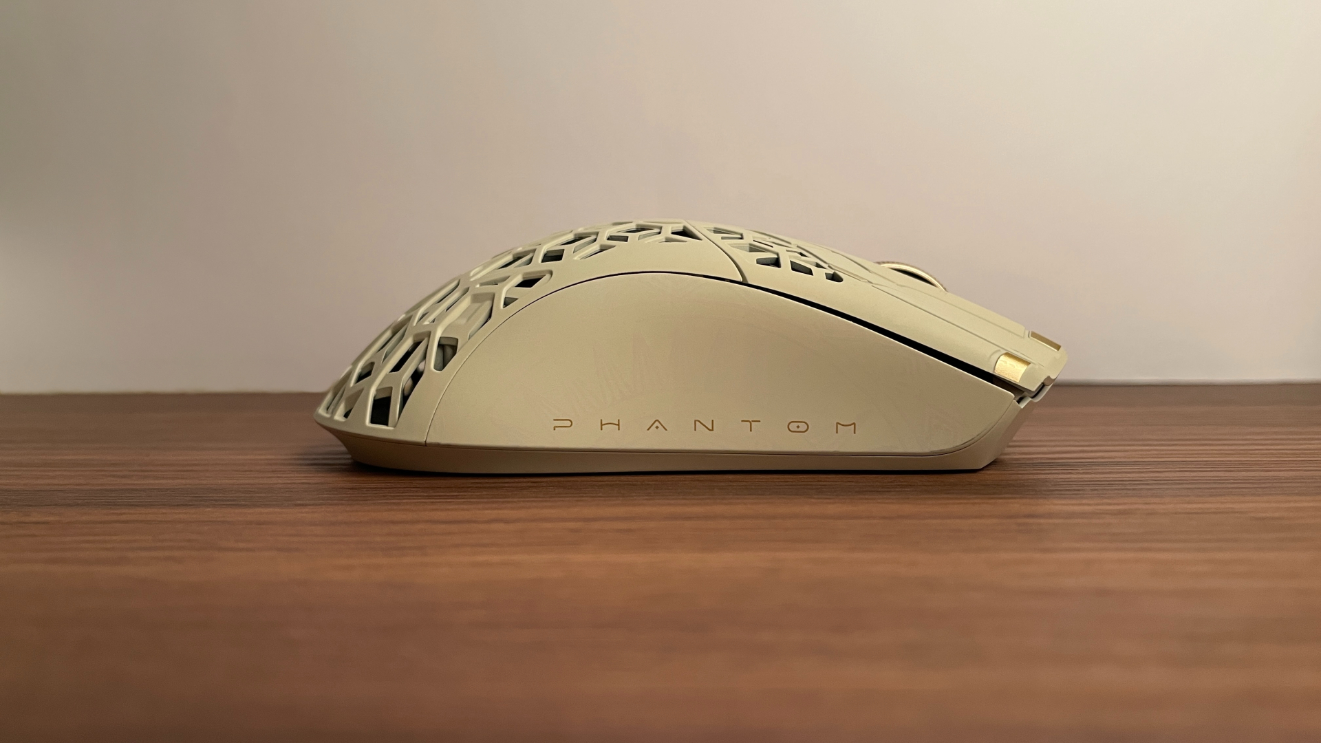 Side profile view of the ATK Phantom gaming mouse.