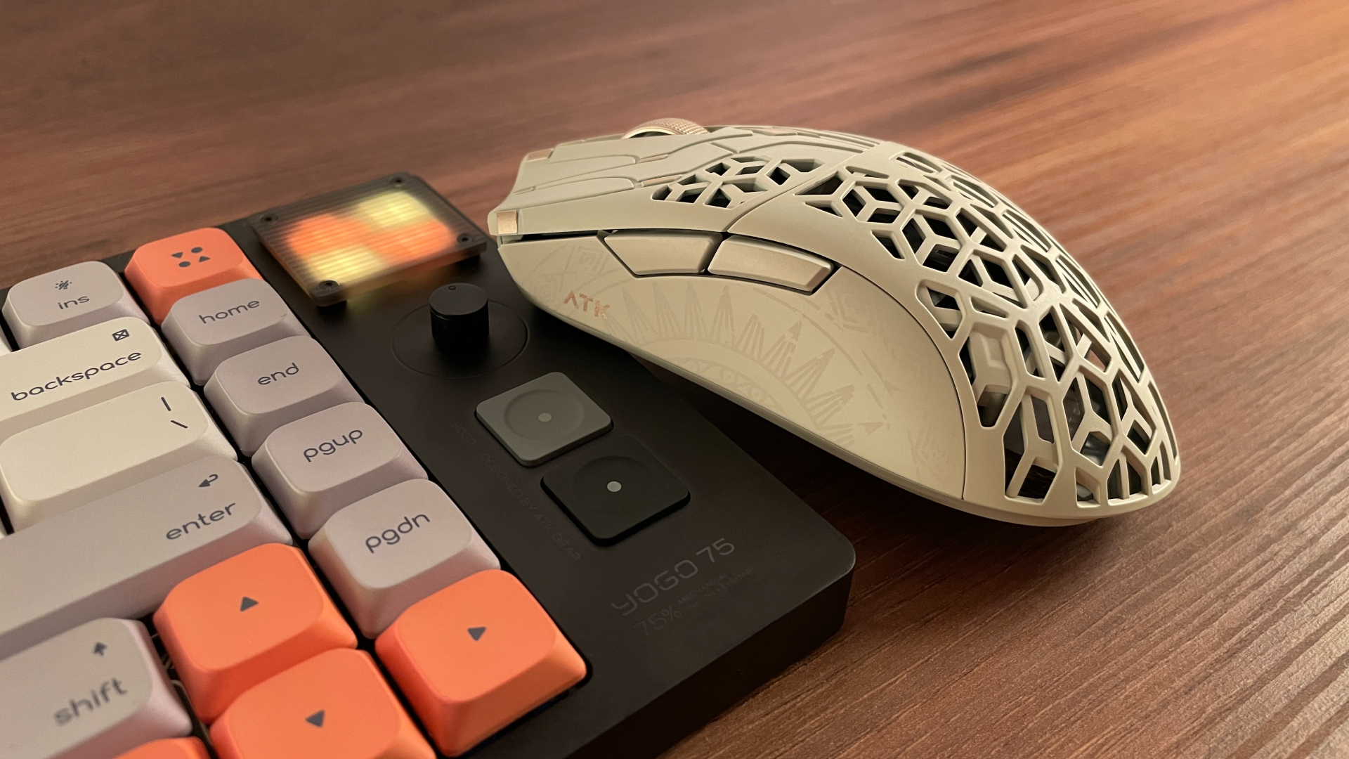 Side view of the ATK Phantom gaming mouse, showing the decorative pattern on the shell.