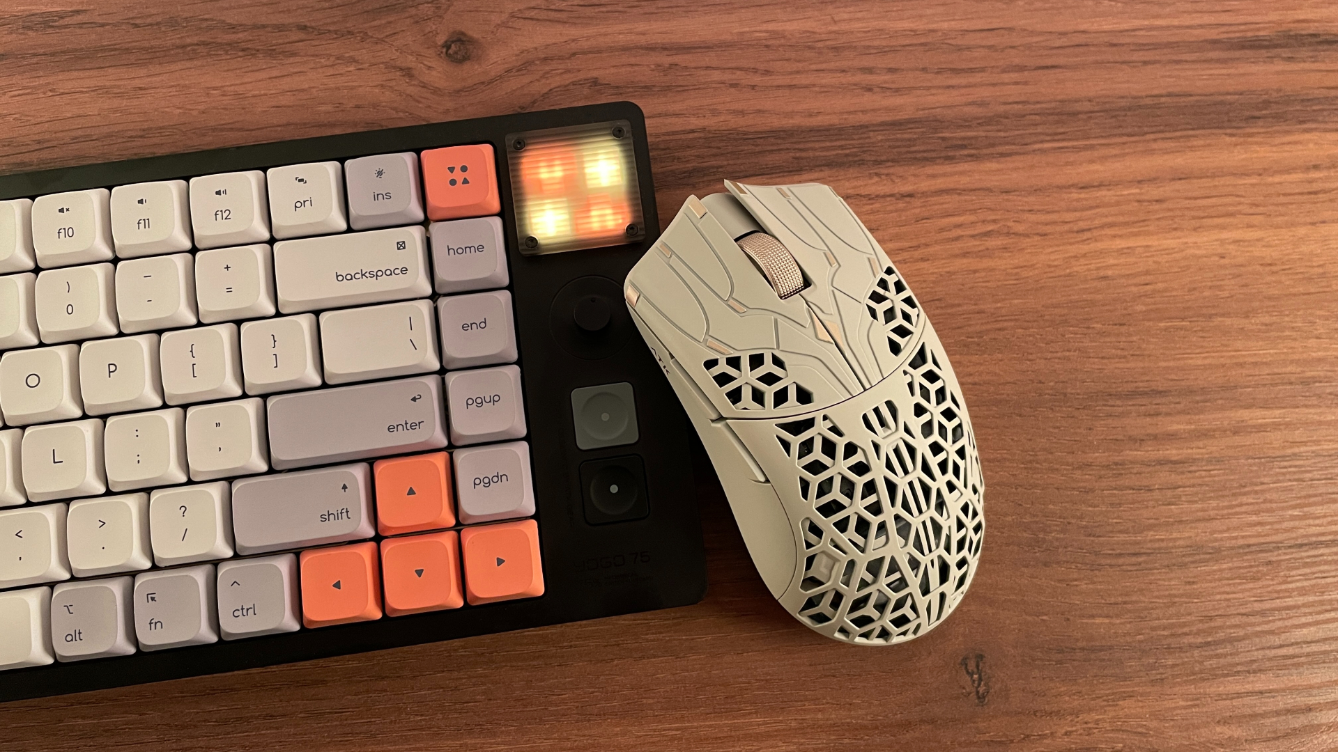The ATK Phantom gaming mouse shown in a stylized close-up photo.