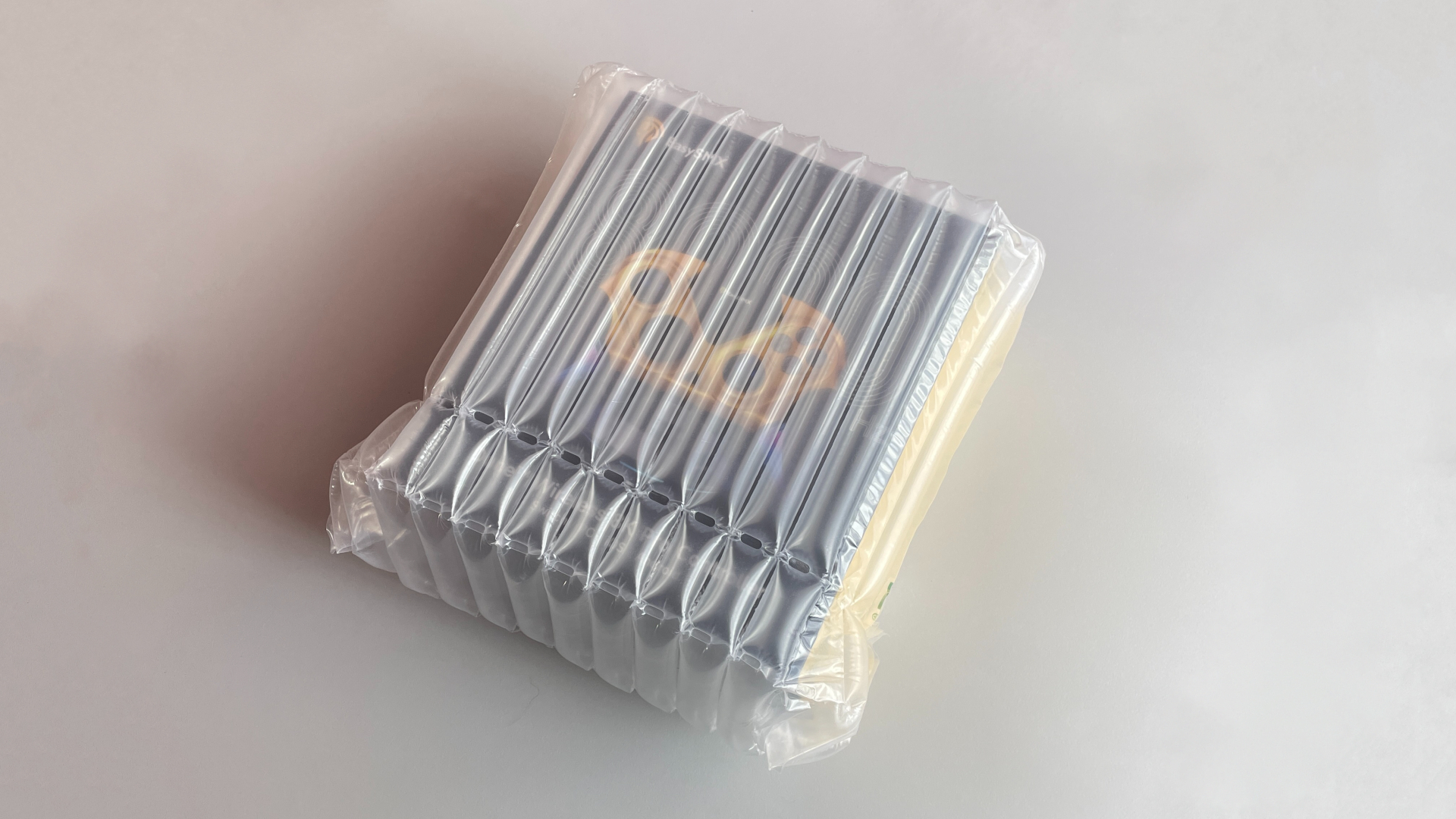 EasySMX Dune 8K Review – A Close Encounter with a One-of-a-Kind Controller 3 EasySMX Dune 8K retail box wrapped in an inflatable air-column sleeve.